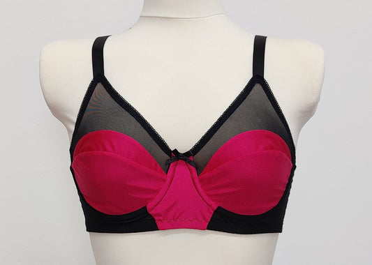 Audrey is beautiful and comfortable full bust, soft cup bra made in magenta pink and black combination. Size 34B
Sample, worn once for a photo shoot. Ready to ship!