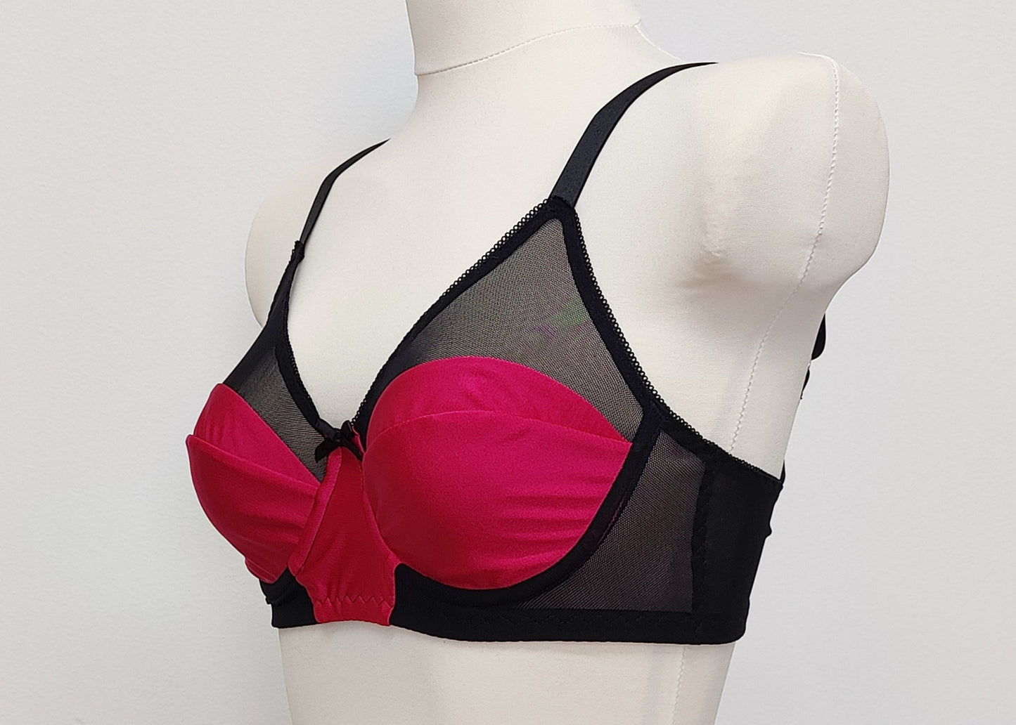 Audrey is beautiful and comfortable full bust, soft cup bra made in magenta pink and black combination. side view, 
Size 34B
Sample, worn once for a photo shoot. Ready to ship!