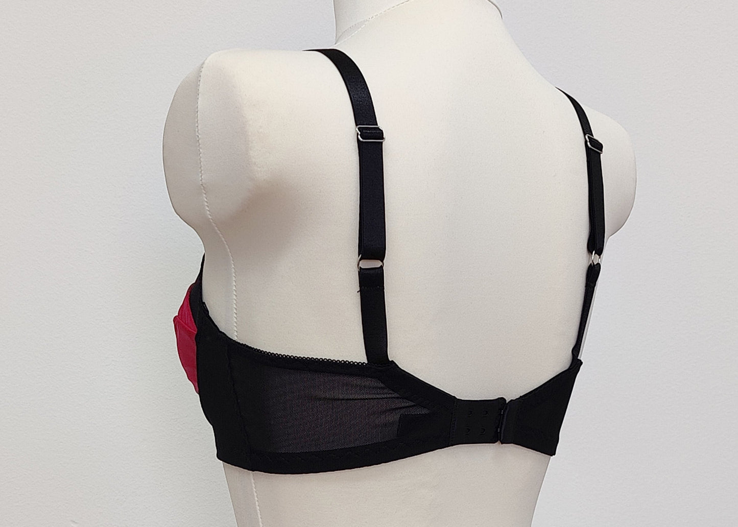Audrey is beautiful and comfortable full bust, soft cup bra made in magenta pink and black combination. back view
Size 34B
Sample, worn once for a photo shoot. Ready to ship!