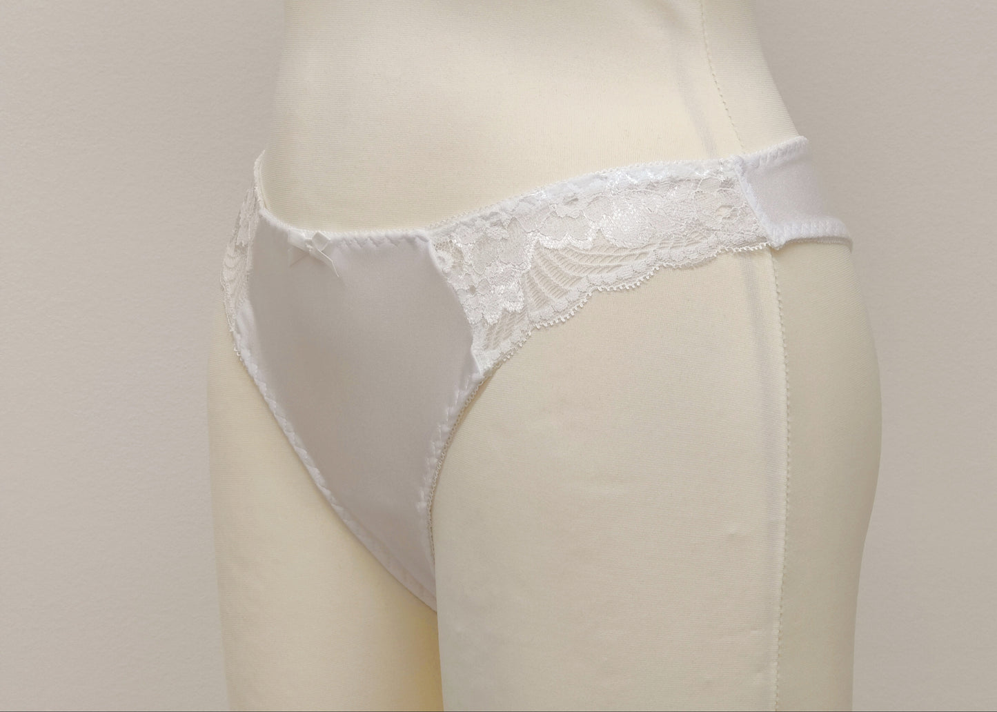 white Eve thong panties with lace side panels, side view