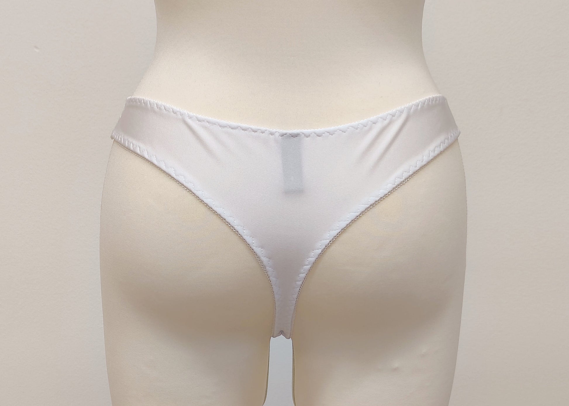 white Mia thong with sheer side panels, back view