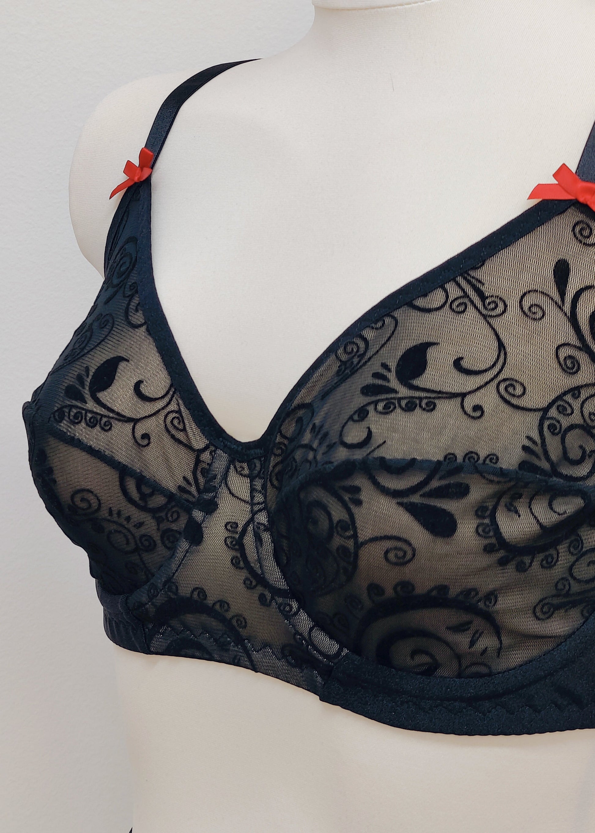 black flocked velvet mesh full cup bra, with red satin bows, size US 36C