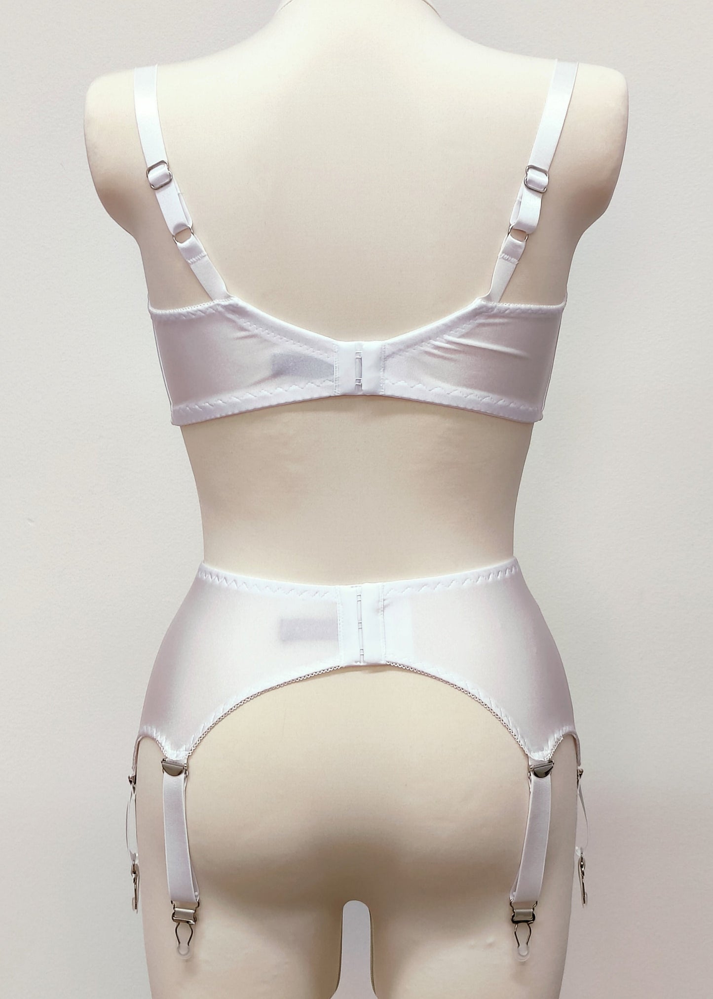 white, wide, 6 strap Scarlett garter belt with side lace inserts, shown with matching Lucy bra, back view