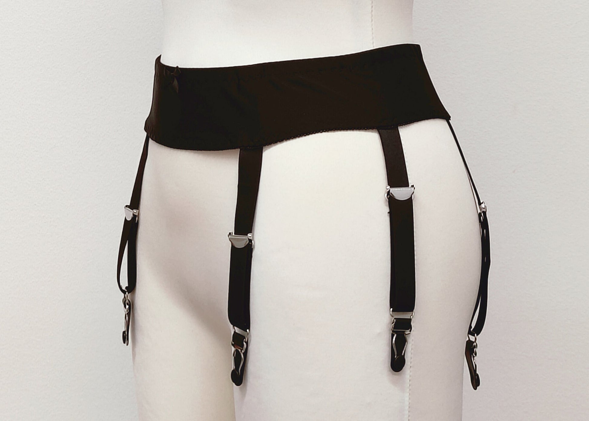 black narrow 60's style Summer garter belt with 6 straps, side view