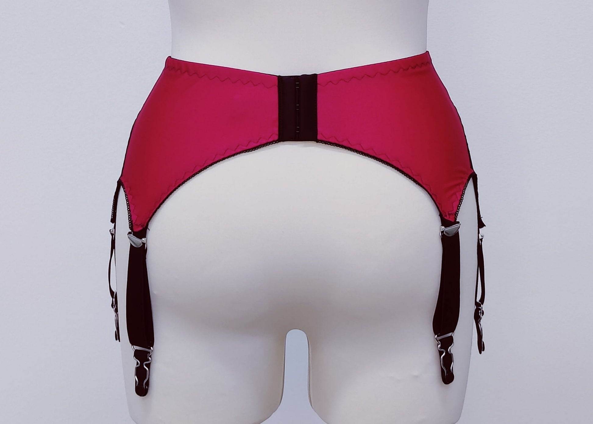 Magenta with black lace and straps, 6 strap Mona retro style garter belt, back view
