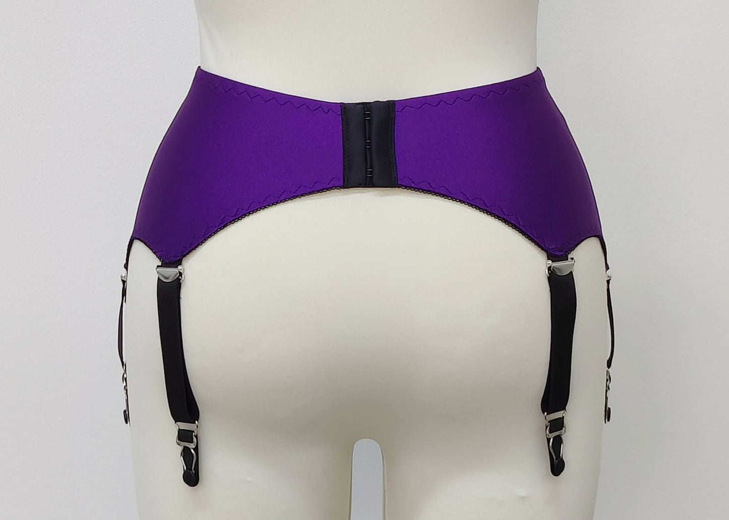 purple with black lace and 6 straps Scarlett garter belt in size S, back view