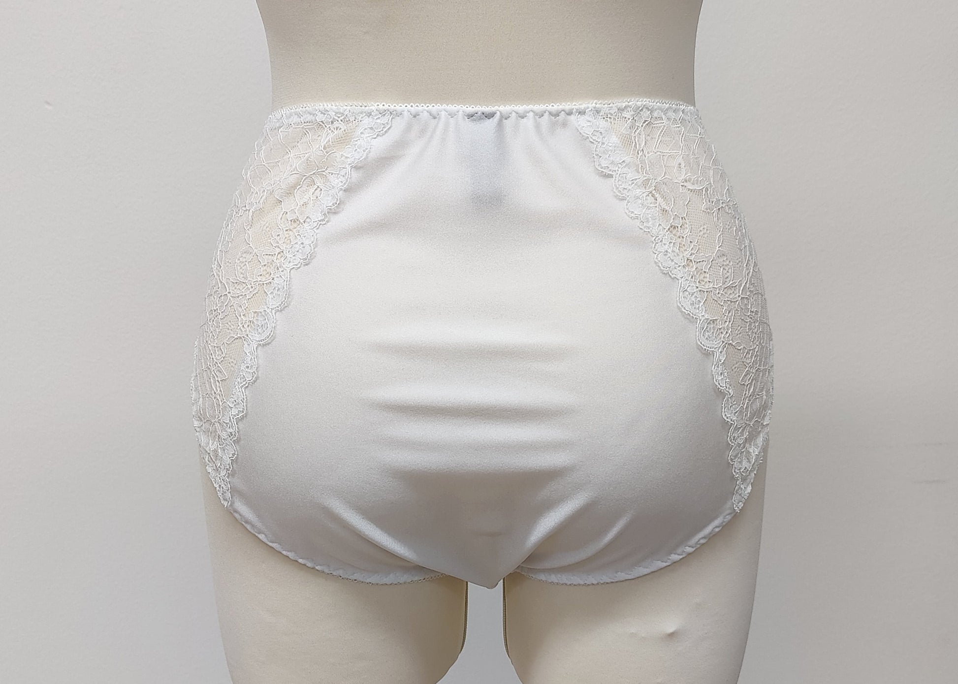 white high waist panties with lace side panels, back view
