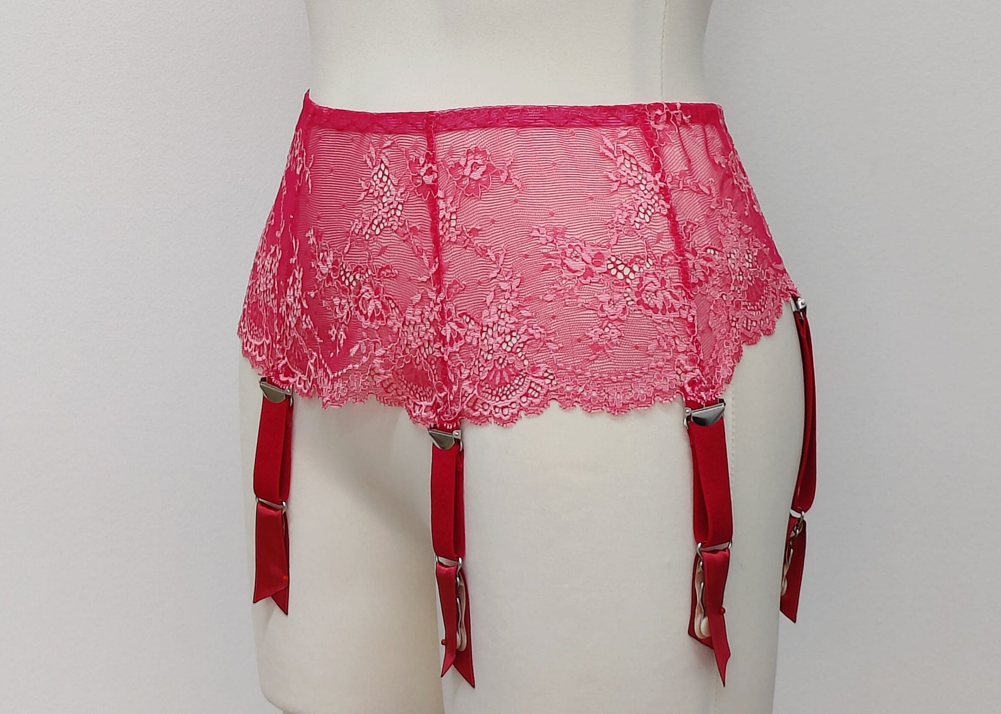 hot pink lace garter belt with 6 straps, side view
