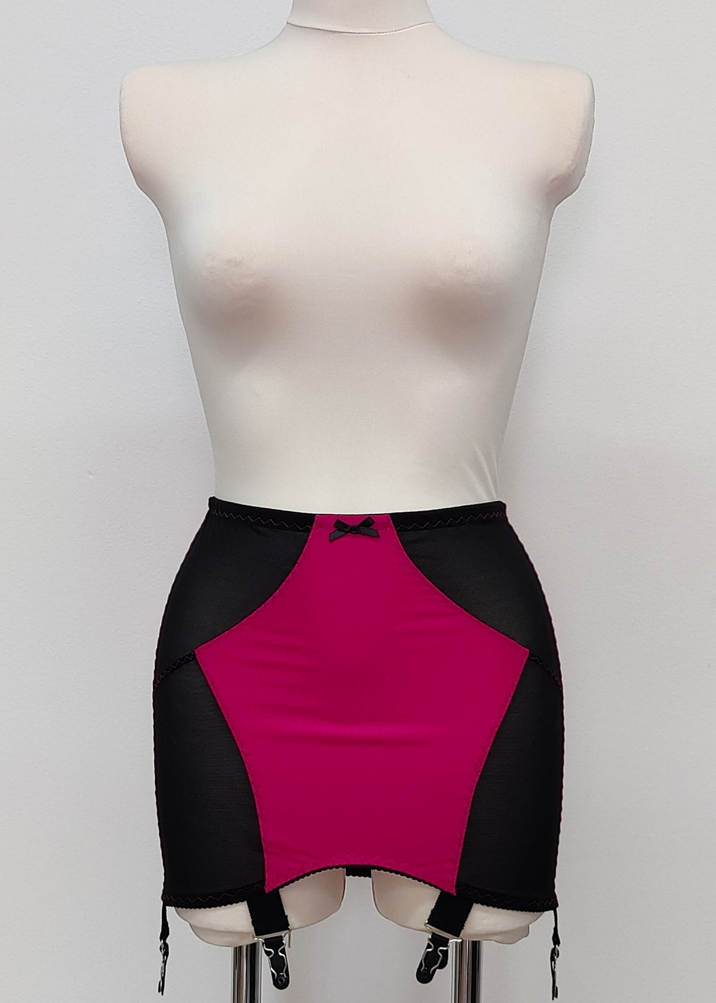 magenta with black Open bottom Glenda girdle made with opaque front and back panels with sheer power mesh side panels. Can be made with 4 or 6 extra wide straps.