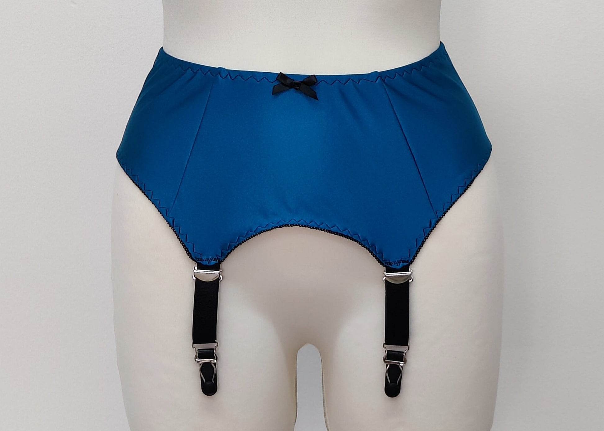 blue classic retro style Greta garter belt with 4 adjustable black straps