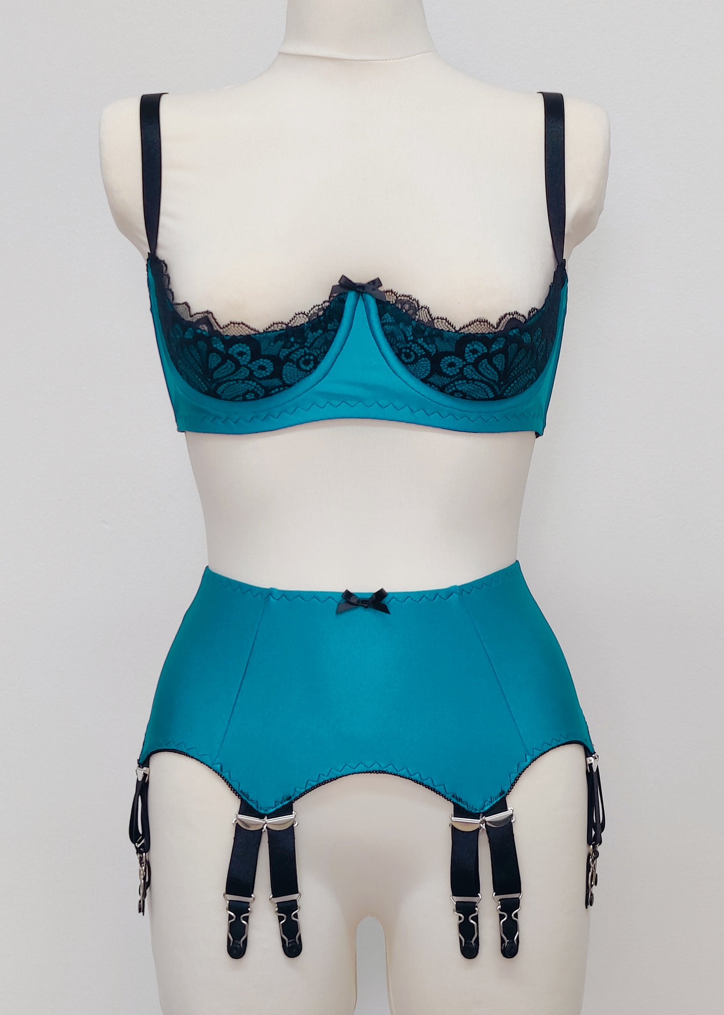 teal and black 12 strap Joan garter belt + Lucy quarter cup bra