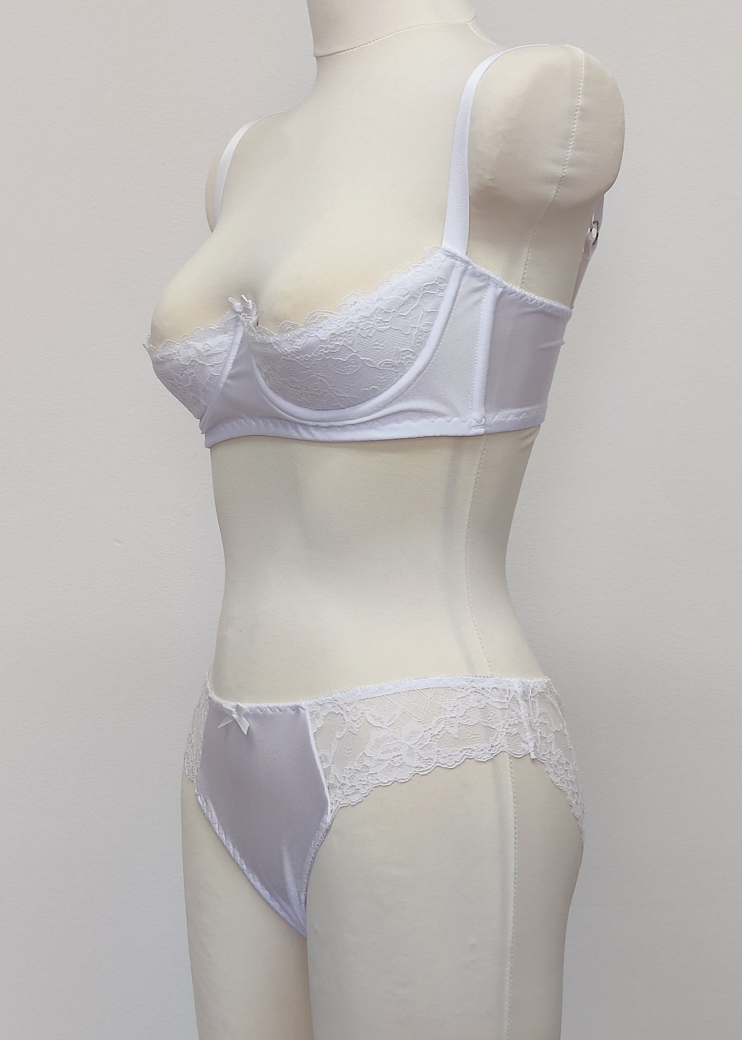 white lace quarter cup Lucy bra, shown with matching panties, side view