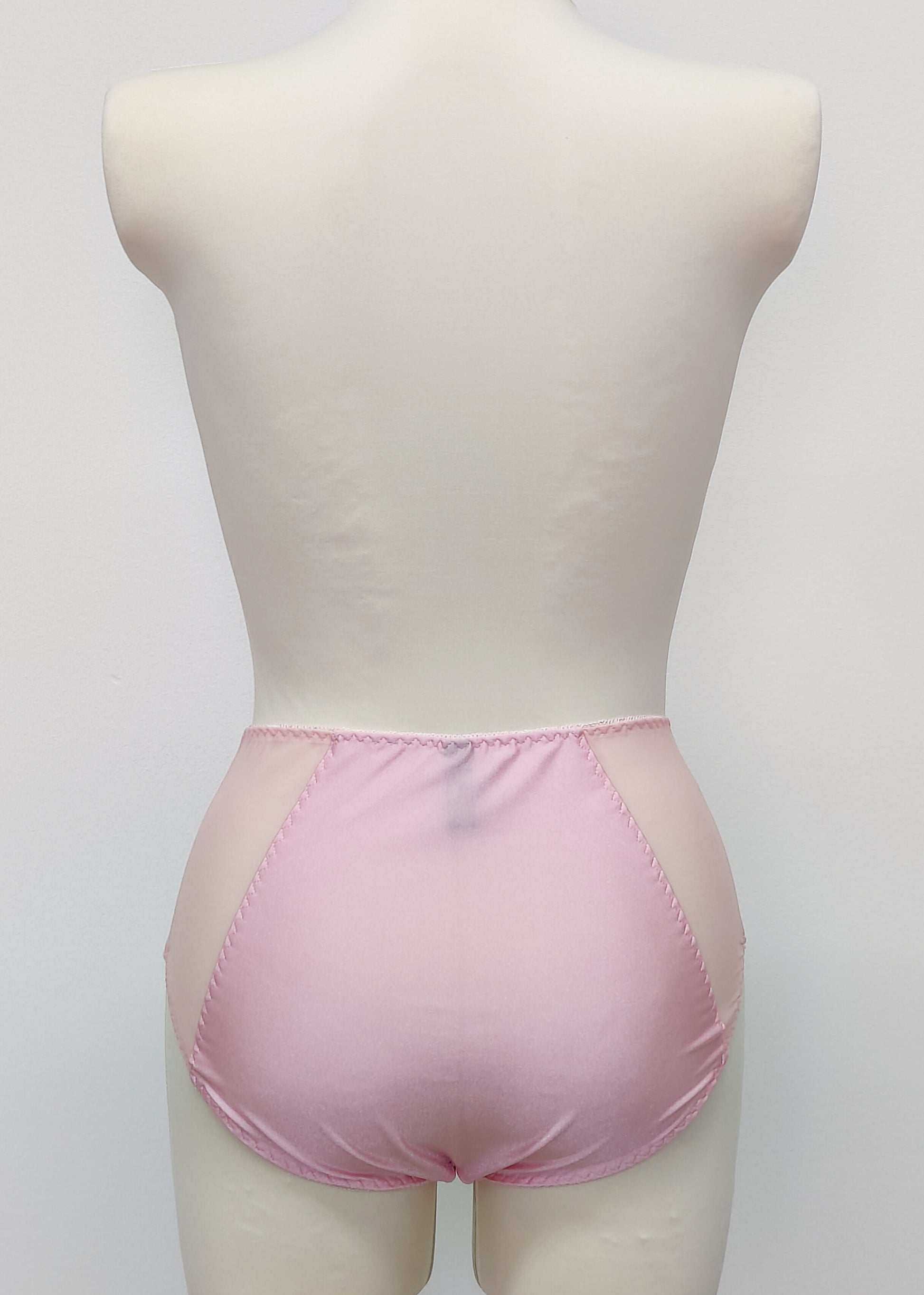 pink high waist Mia panties with sheer side panels, back view