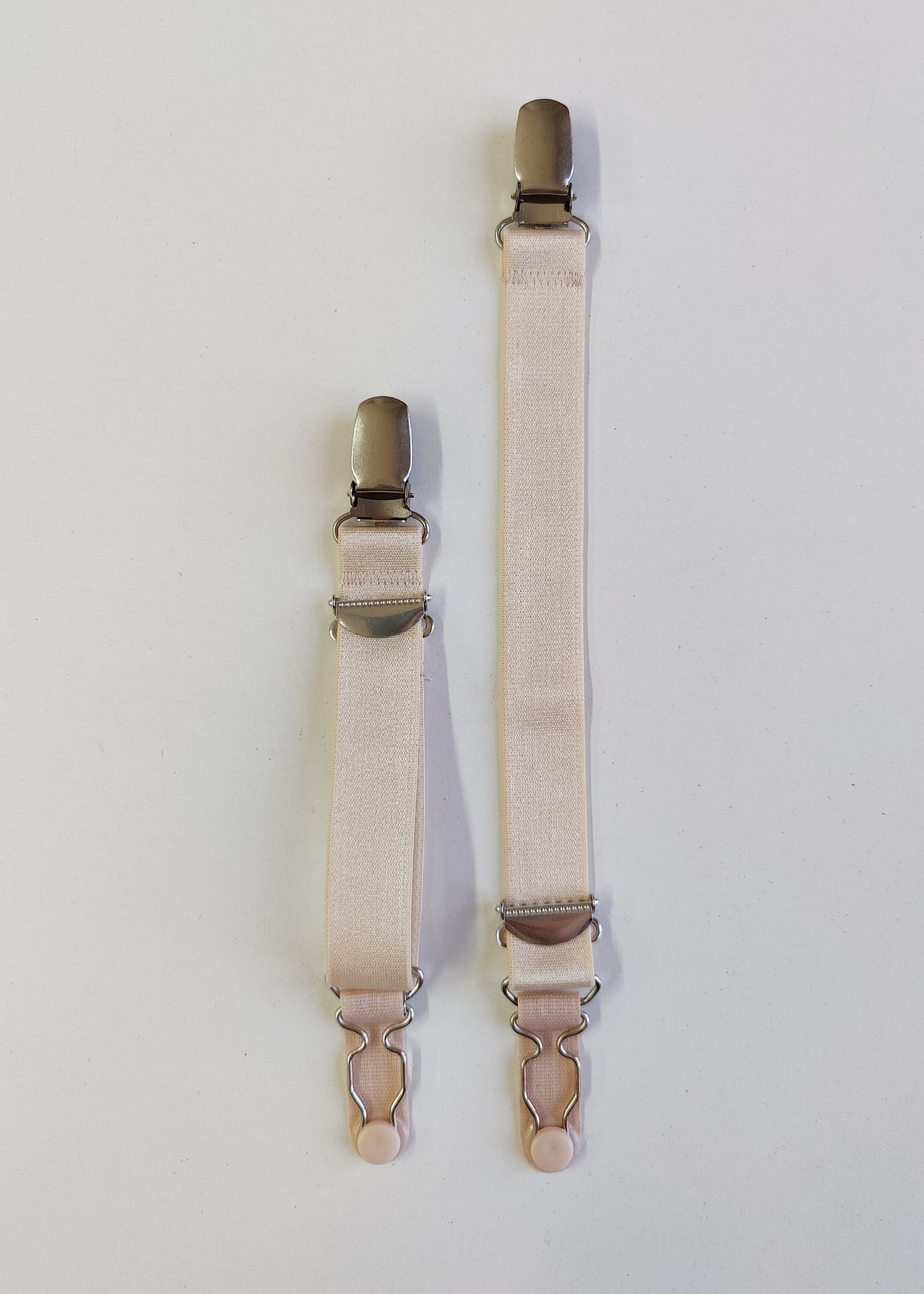 beige clip on garter straps, suspender straps