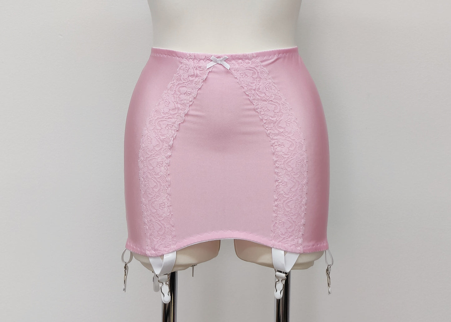 pink 6 strap Rhonda open bottom girdle, with pink lace trim on the front and white sheer back