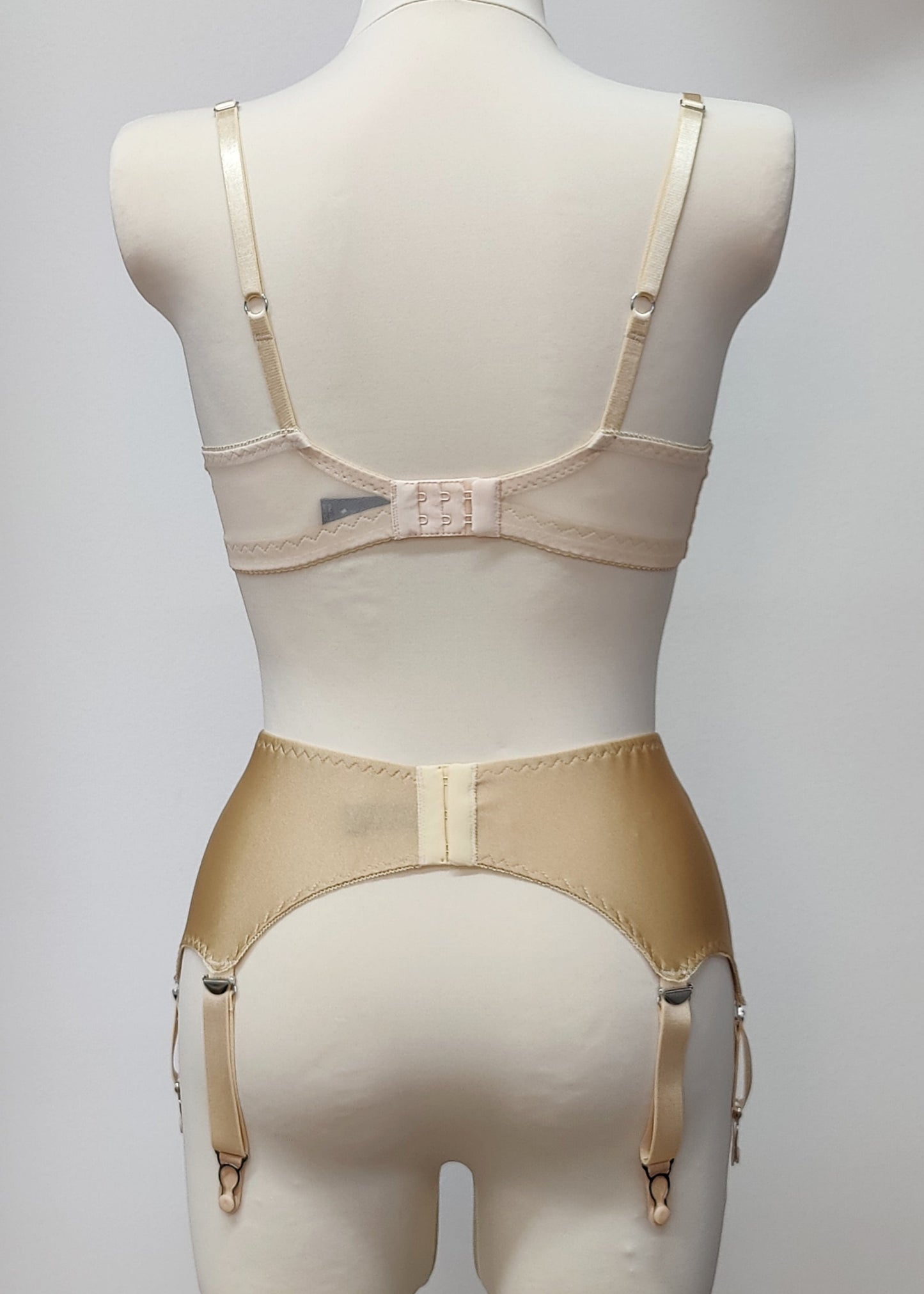 beige, wide, 6 strap Scarlett garter belt with side lace inserts, shown with matching Coco lace bralette, back view