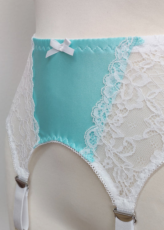 Aqua colour Lycra with white lace Rita garter belt with 6 Y-straps and a bow detail, detail