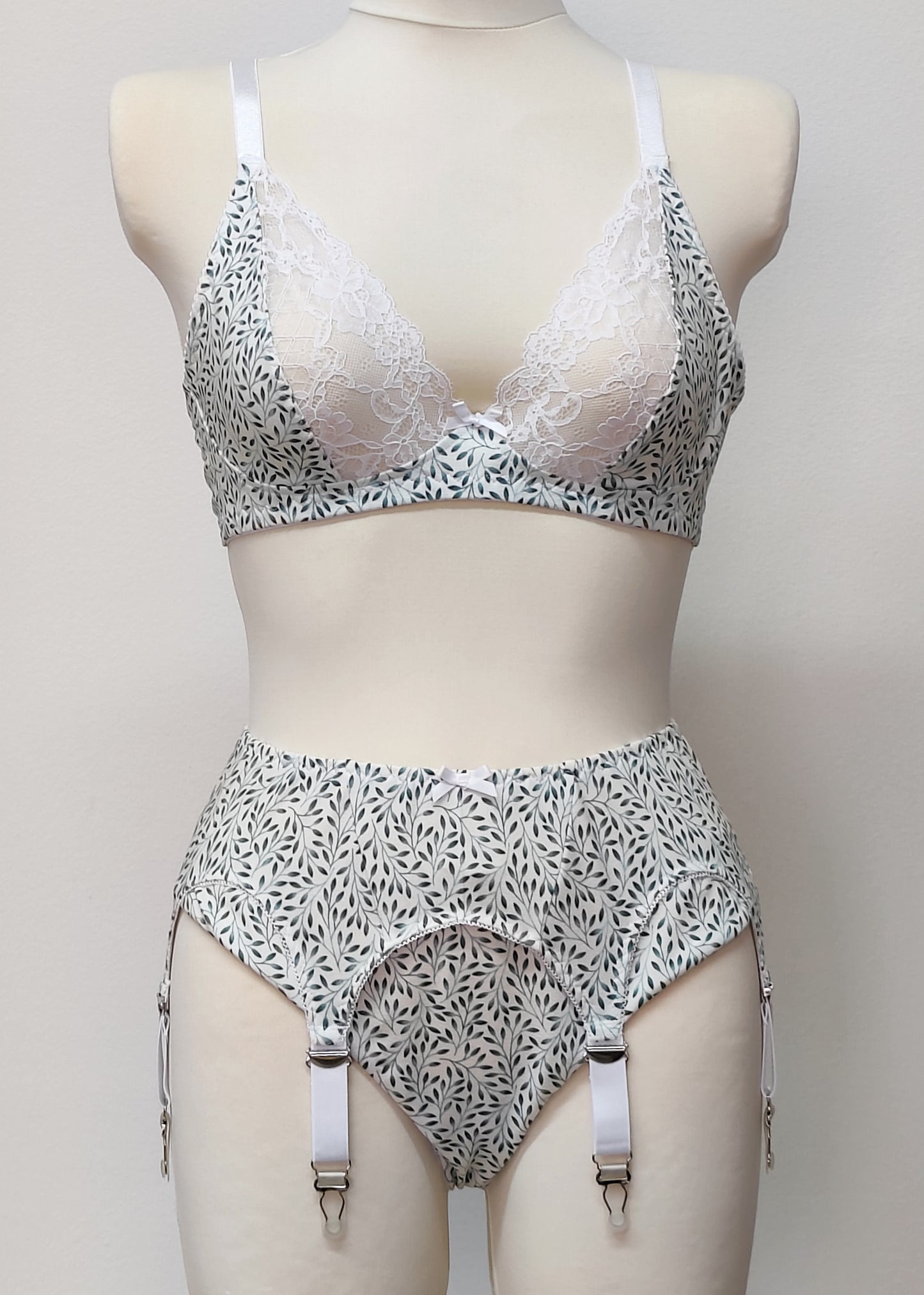 white cotton with tiny green leaves Mila bralette, with matching Ida panties and Etta garter belt