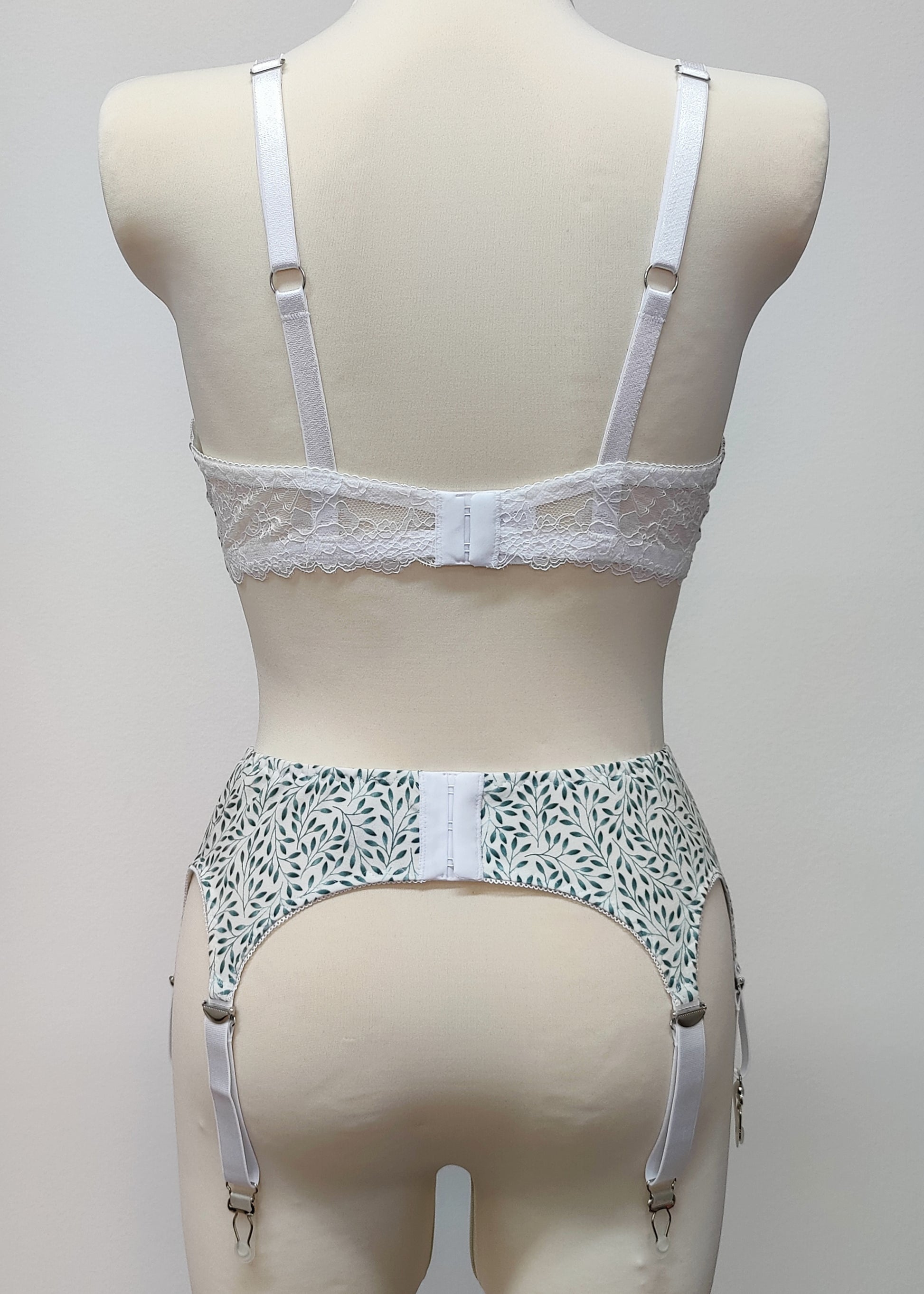 white cotton with tiny green leaves Etta garter belt, with matching Mila bralette , back view