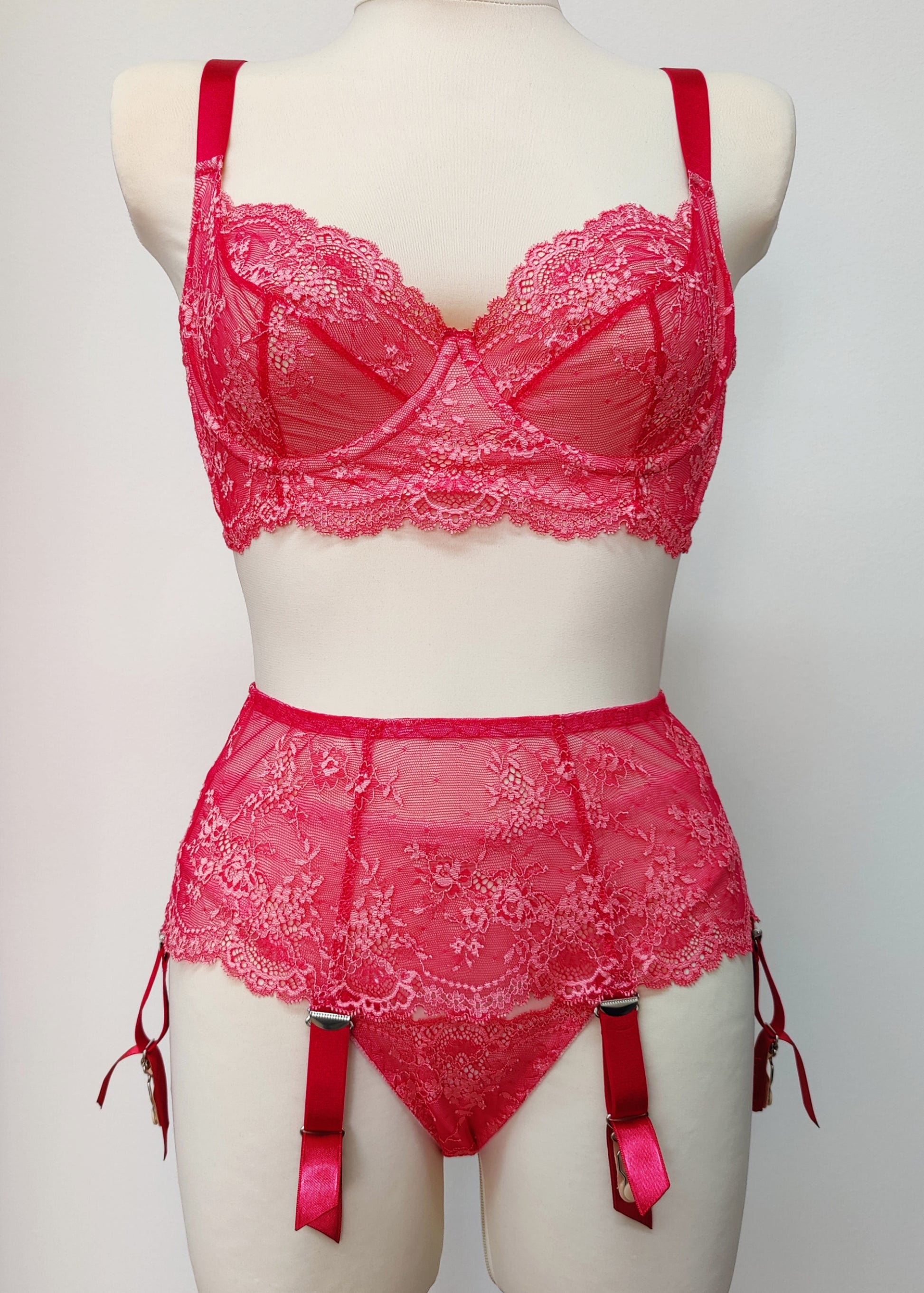 hot pink lace Judith garter belt with 6 straps, shown with matching bra and panties