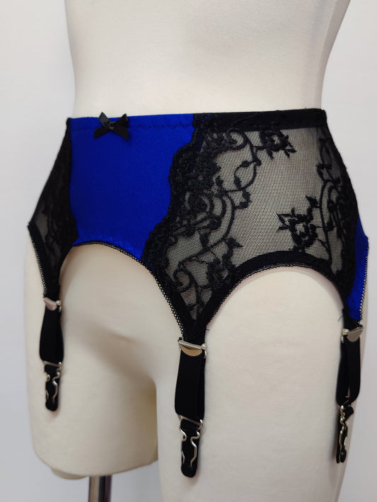 blue high waist retro style Mona garter belt with black lace side panels and 6 straps, side view