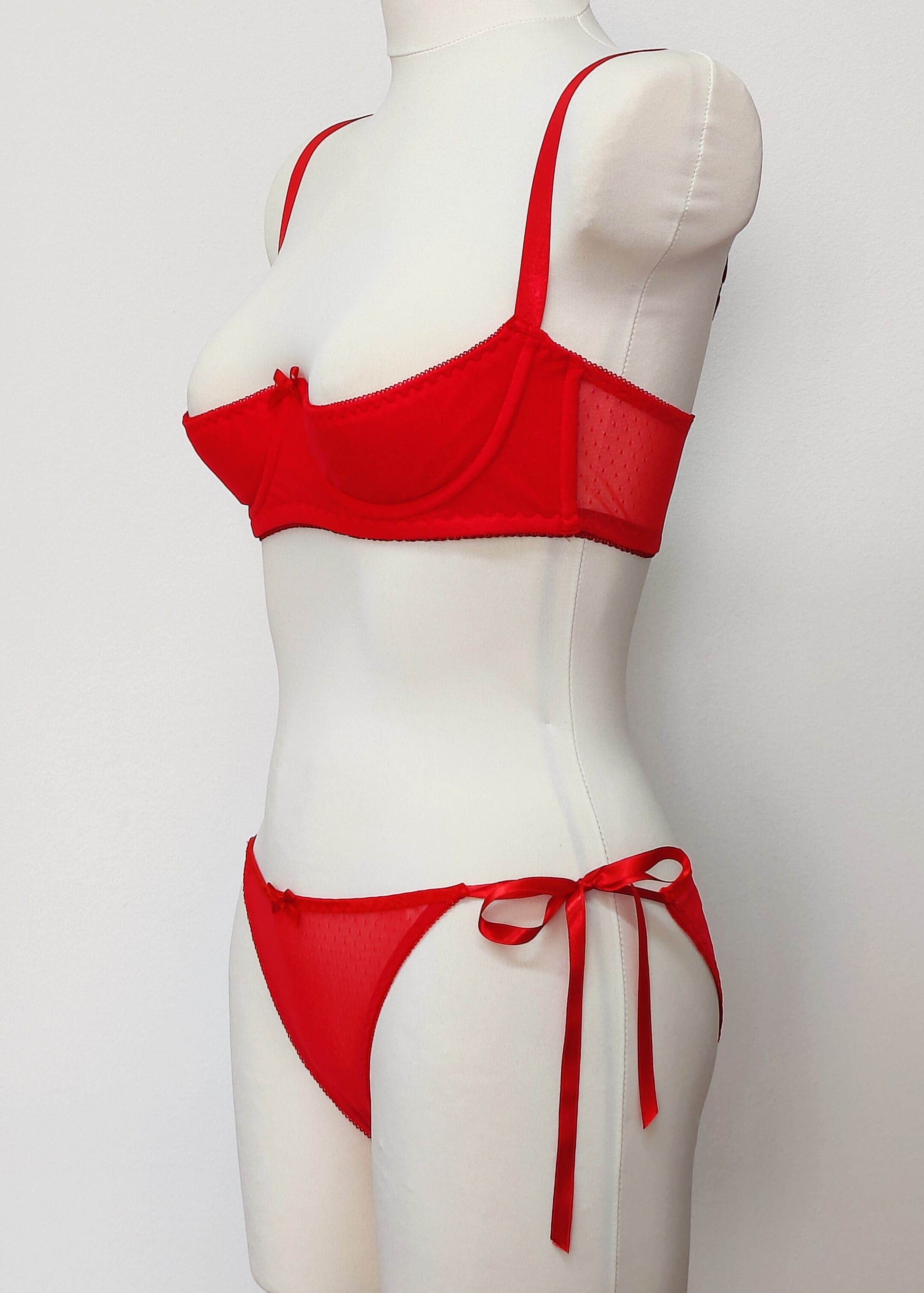 red Ella quarter cup bra, with red dot mesh fabric,  underwired, shown with matching Irma panties, side view