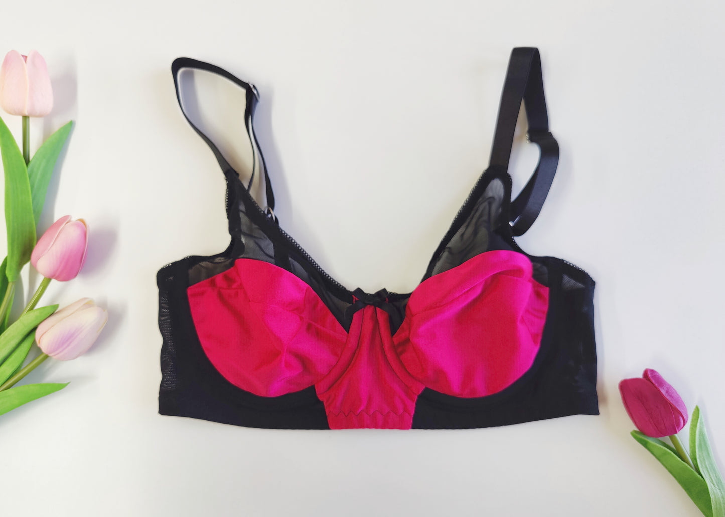 Audrey is beautiful and comfortable full bust, soft cup bra made in magenta pink and black combination. Size 34B
Sample, worn once for a photo shoot. Ready to ship!