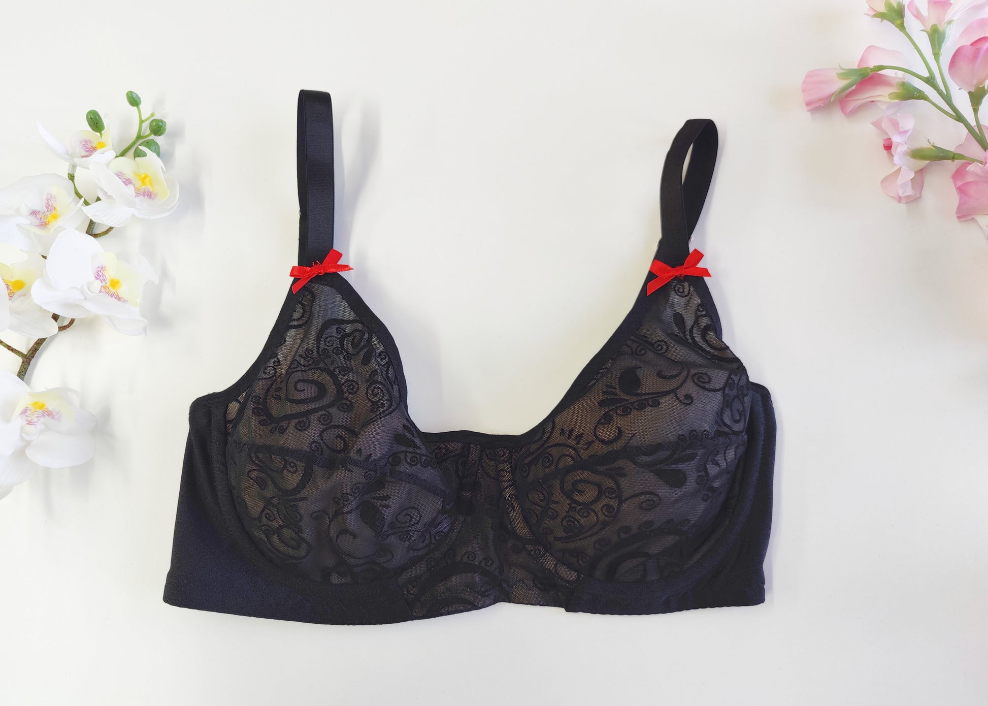 black flocked velvet mesh full cup bra, with red satin bows, size US 36C