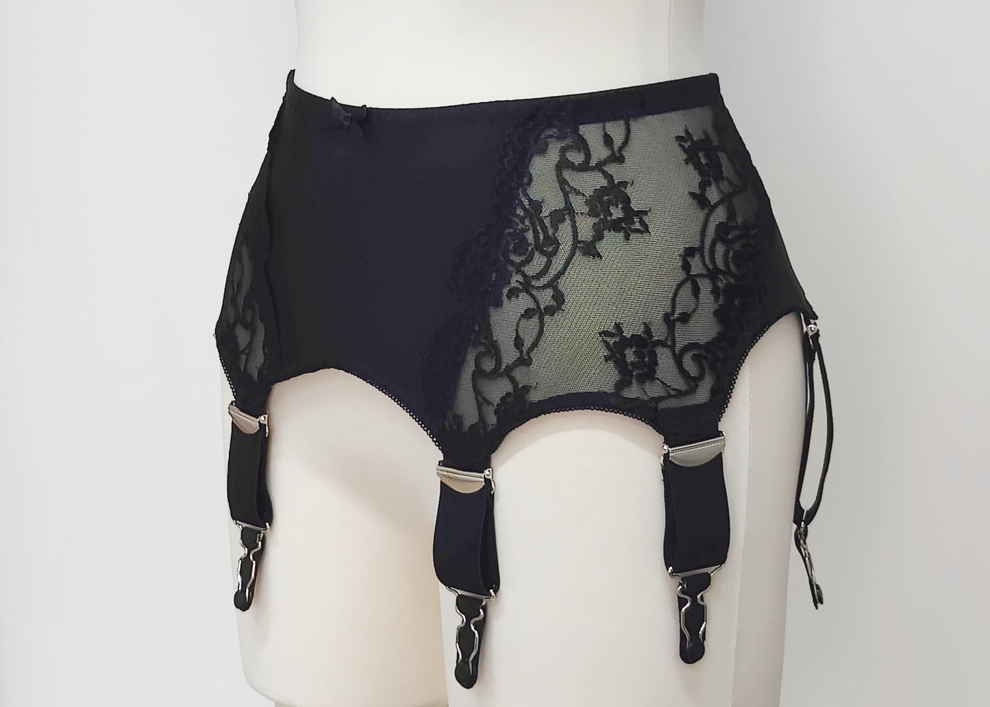 wide retro style Liliane garter belt with 6 extra wide straps and black lace side panels, side view