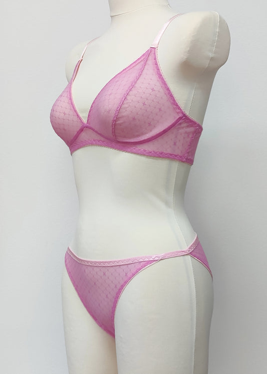 pink sheer string bikini panties made with lingerie mesh with tiny X pattern, shown with matching Chloe bralette, side view