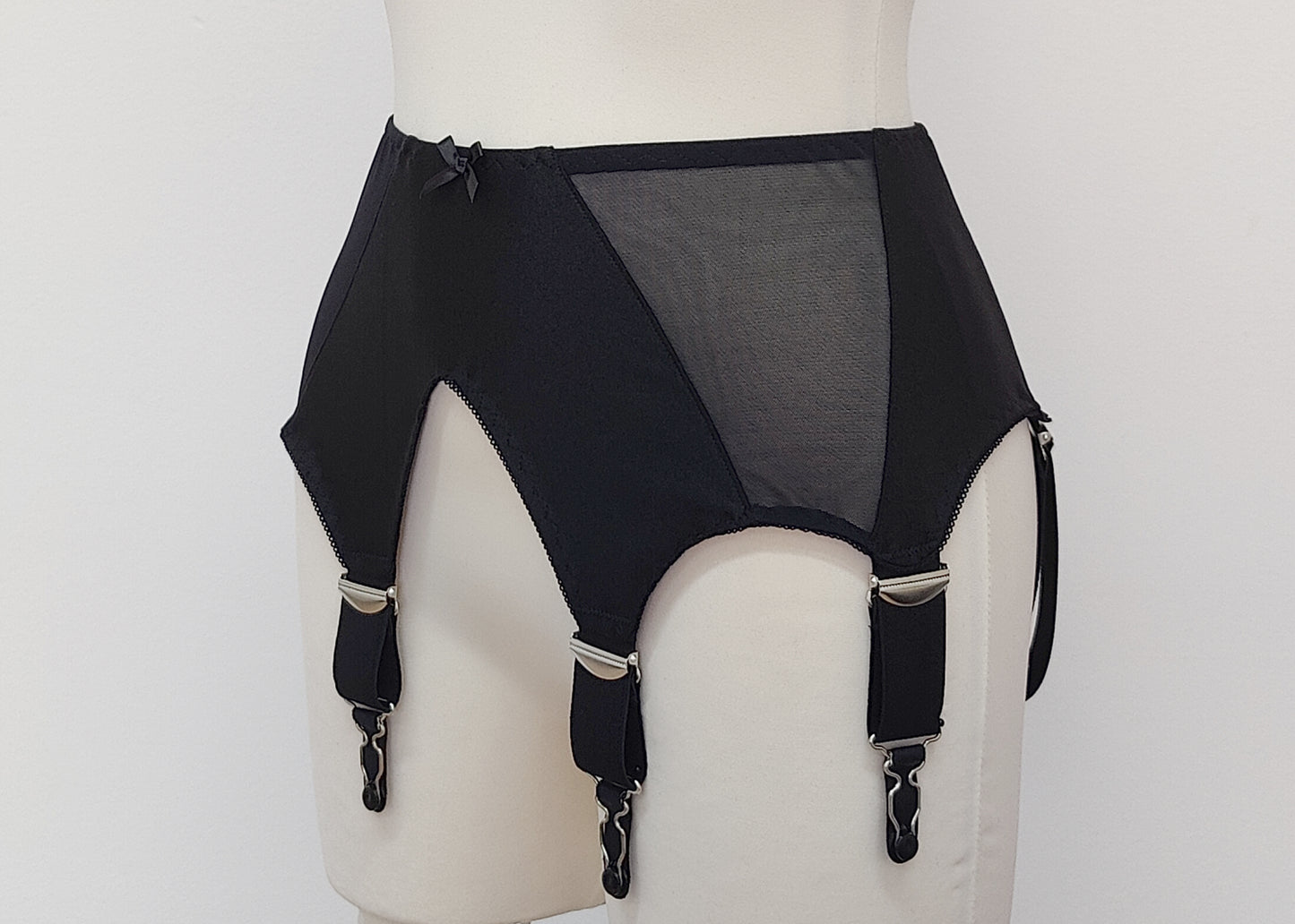 wide, vintage style, Grace garter belt, black with 6 extra wide straps and mesh panels. side view