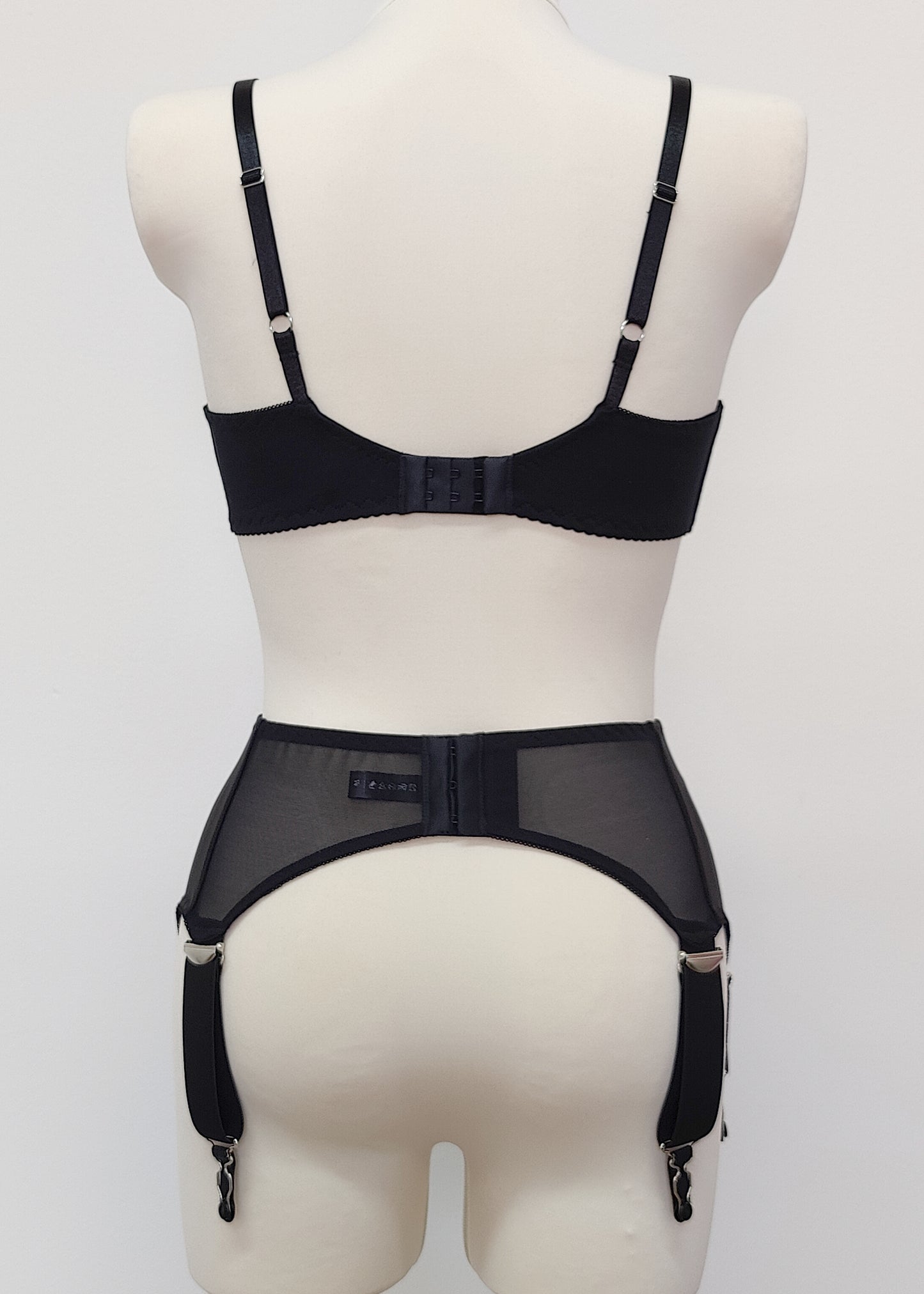 wide, vintage style, Grace garter belt, black with 6 extra wide straps and mesh panels. here shown with black cotton Olivia bralette, back view