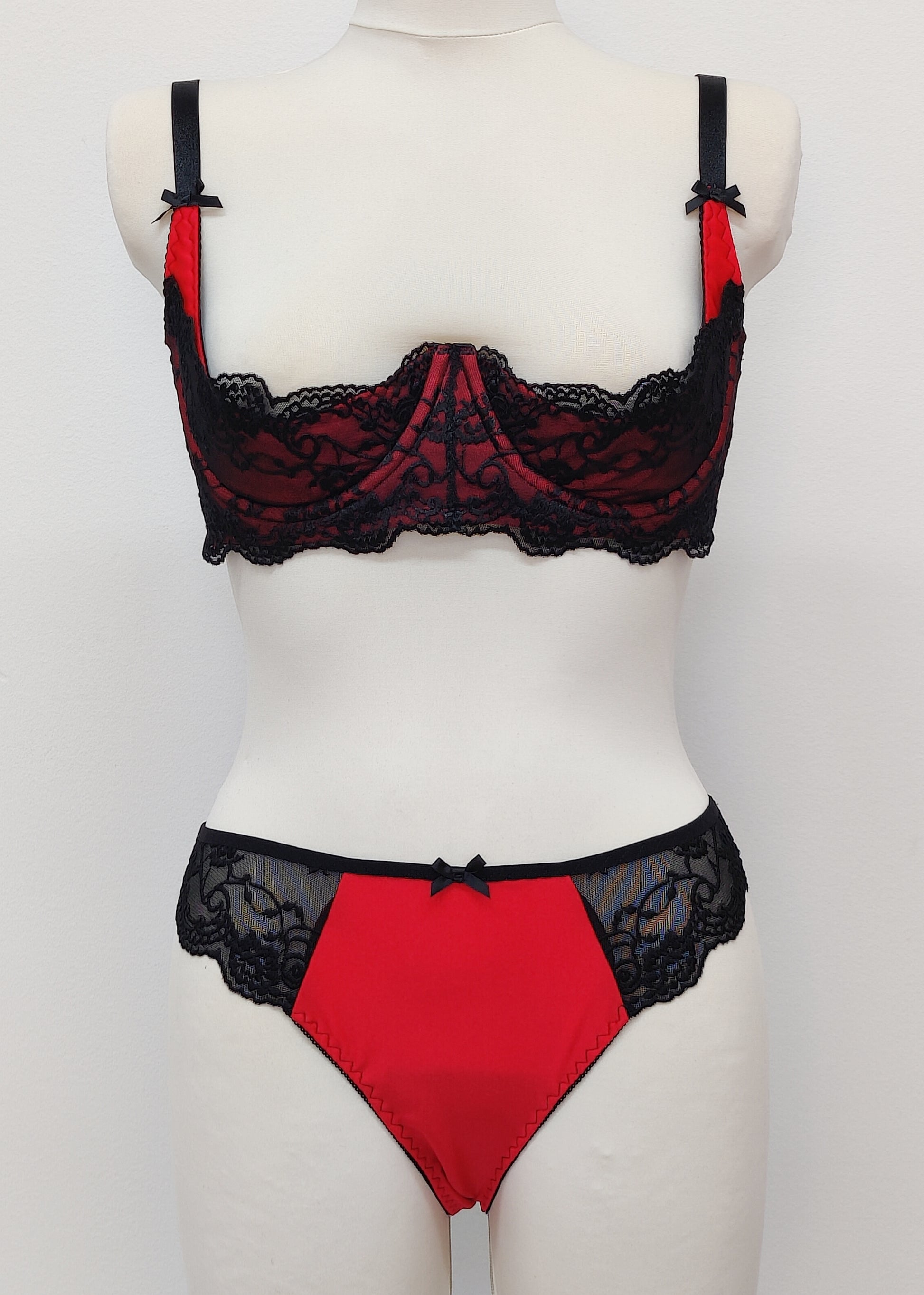 red tanga panties/knickers with black lace side and back, shown with matching Lucrezia quarter cup bra