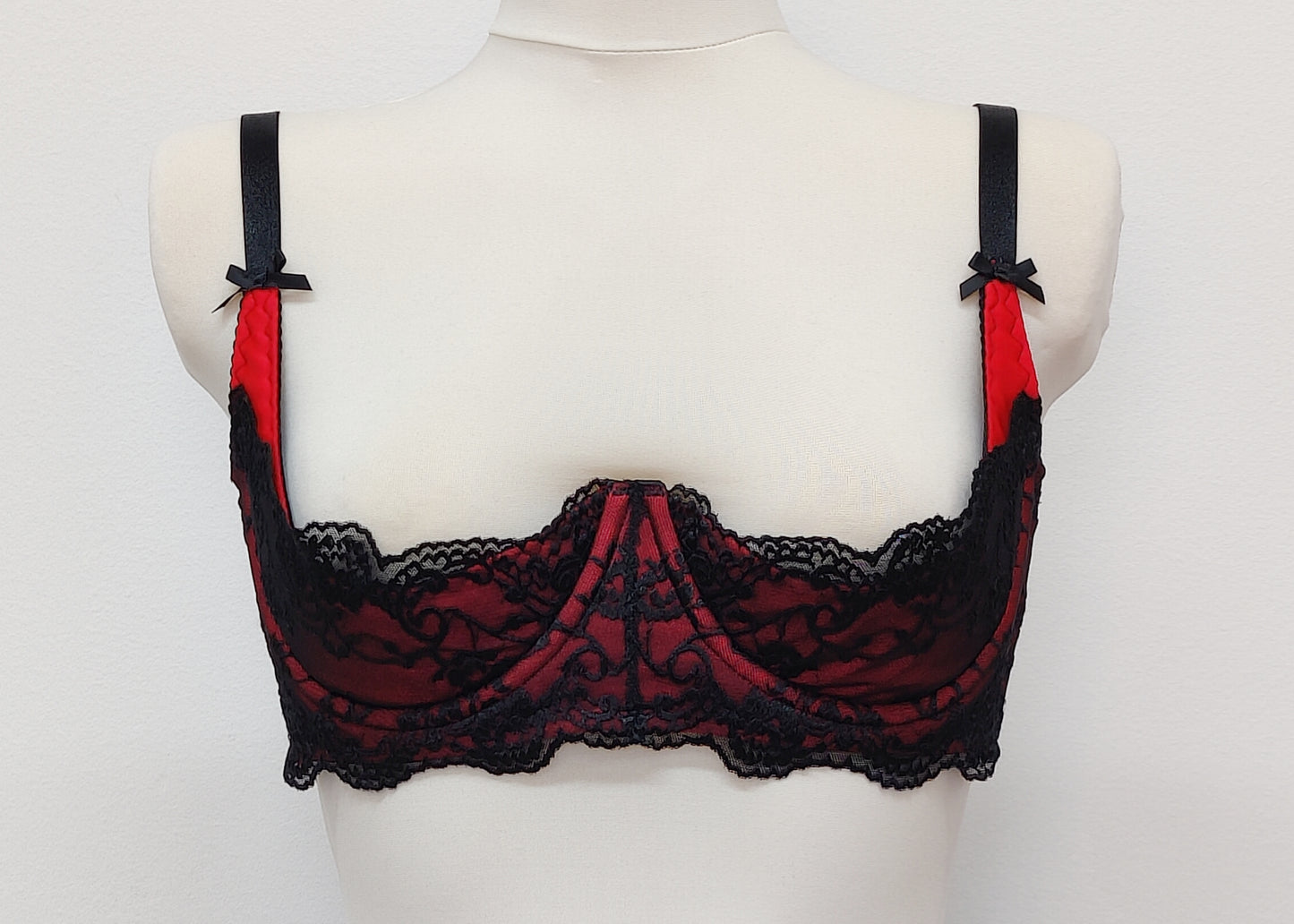 red quarter cup Lucrezia bra with black lace and straps
