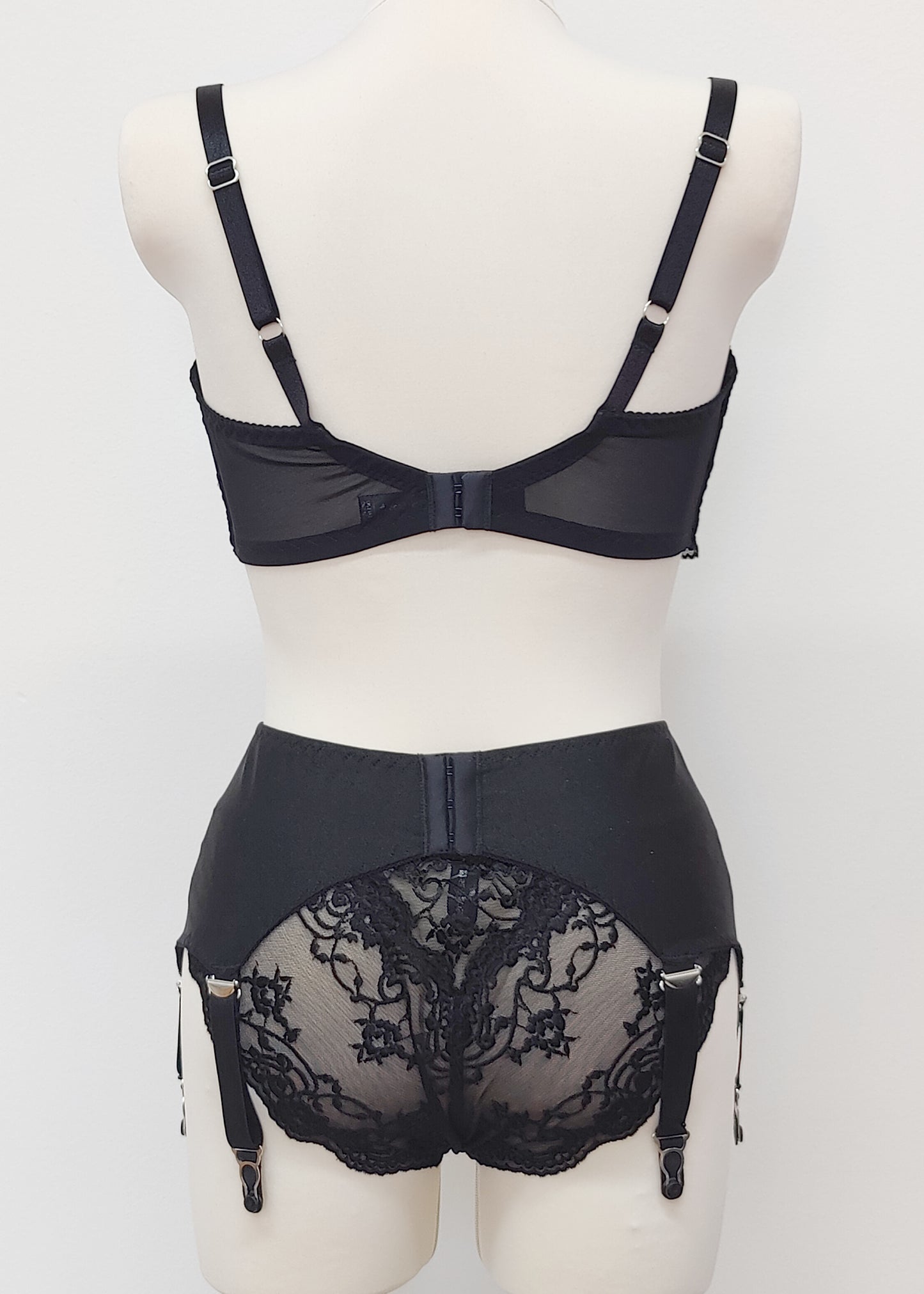 black lace quarter cup Lucrezia bra, with matching Scarlett garter belt and lace panties, back view