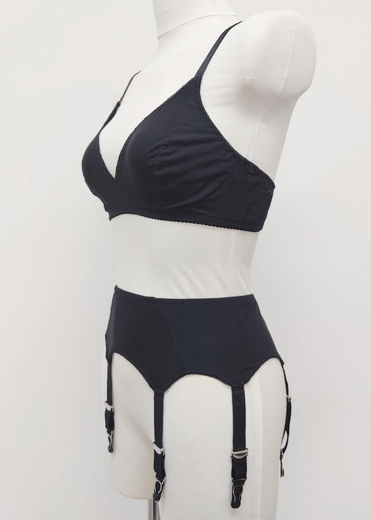 black retro style Dora suspender belt made with cotton jersey, with 6 adjustable straps, here shown with matching bralette, side view