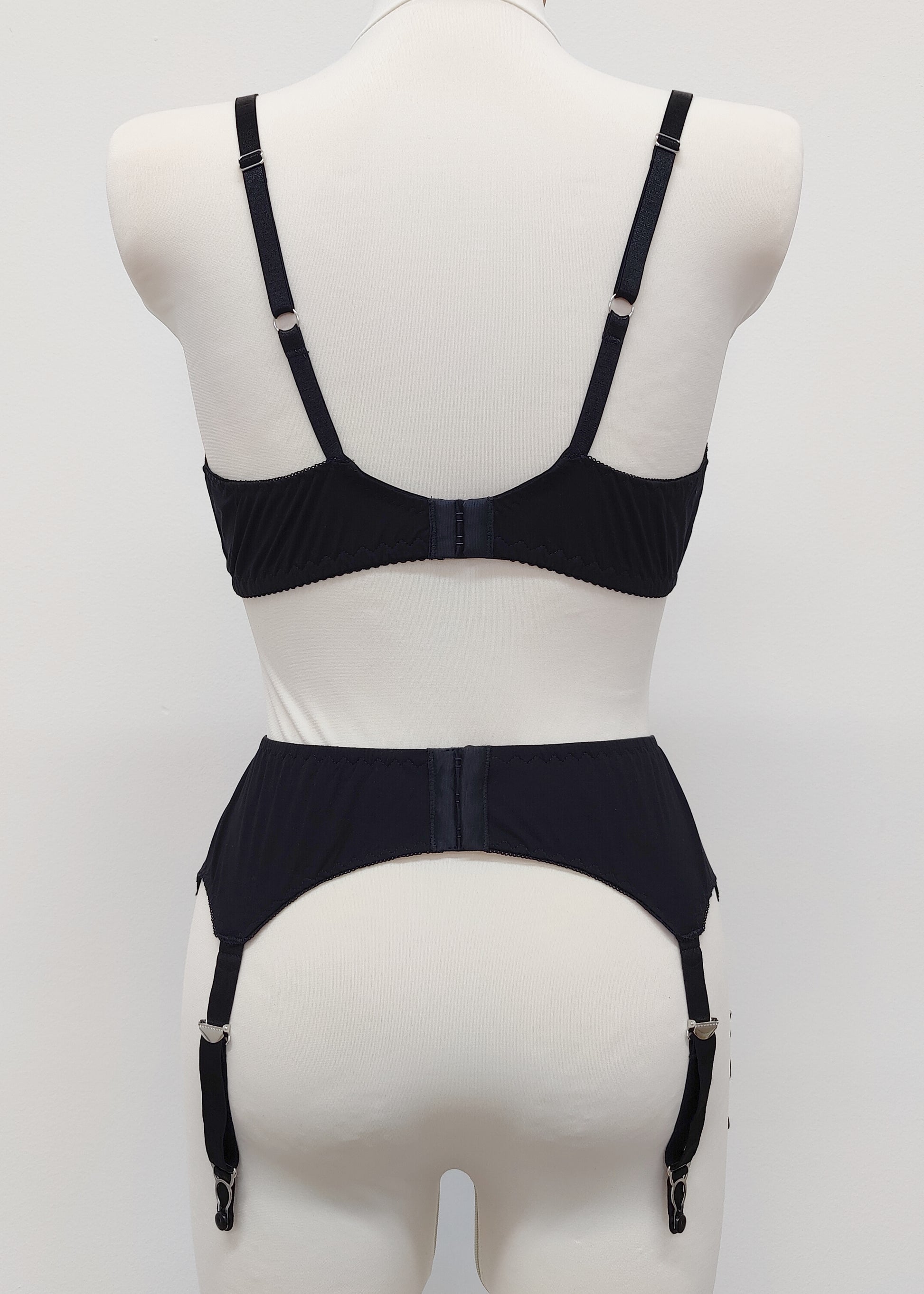 black cotton bralette Olivia, shown with matching garter belt, back view