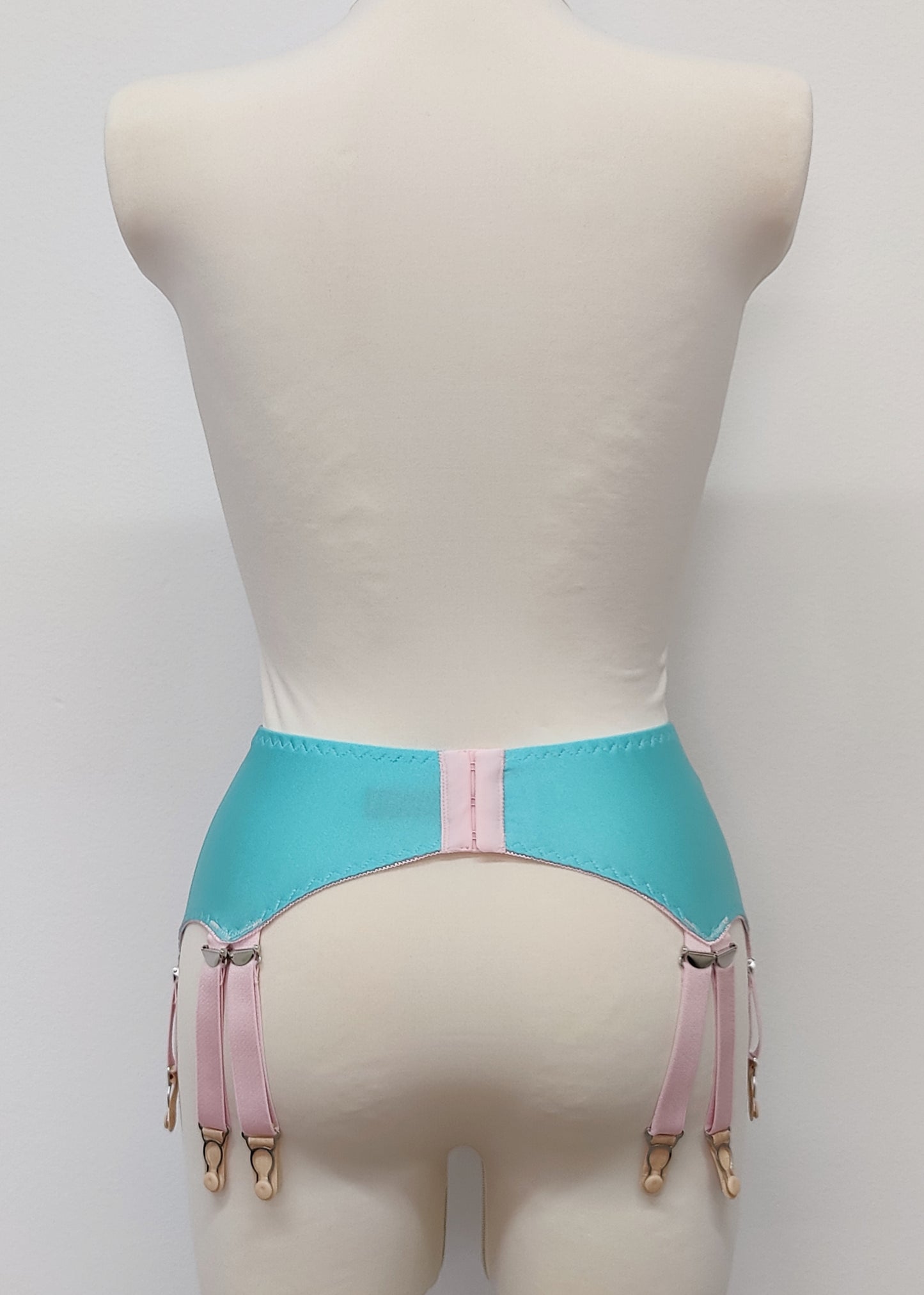 aqua blue 12 strap Joan garter belt with pink straps