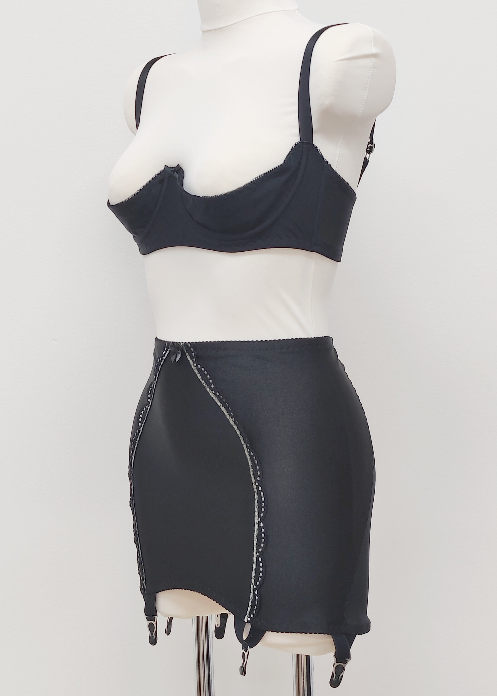 black 6 strap Rhonda open bottom girdle, with sheer back and silvery lace trim on the front, shown with black Gina quarter cup bra