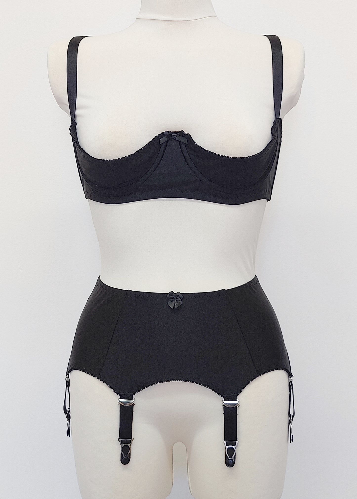 black, classic, retro style Greta garter belt with 6 straps, here shown with matching quarter cup bra