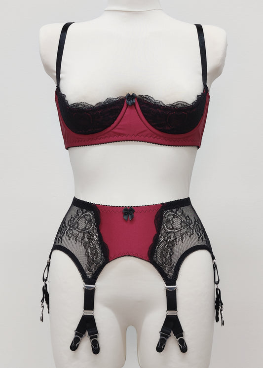 High waist Rita garter belt in maroon color with black lace side panels and 6 Y straps, here shown with matching Lucy quarter cup bra