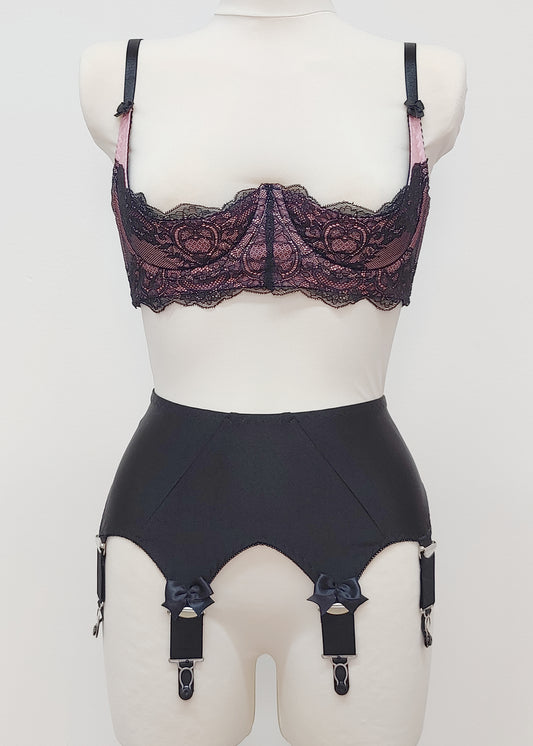 Black Iris garter belt with bows on the front straps, shown here with pink/black Lucrezia bra