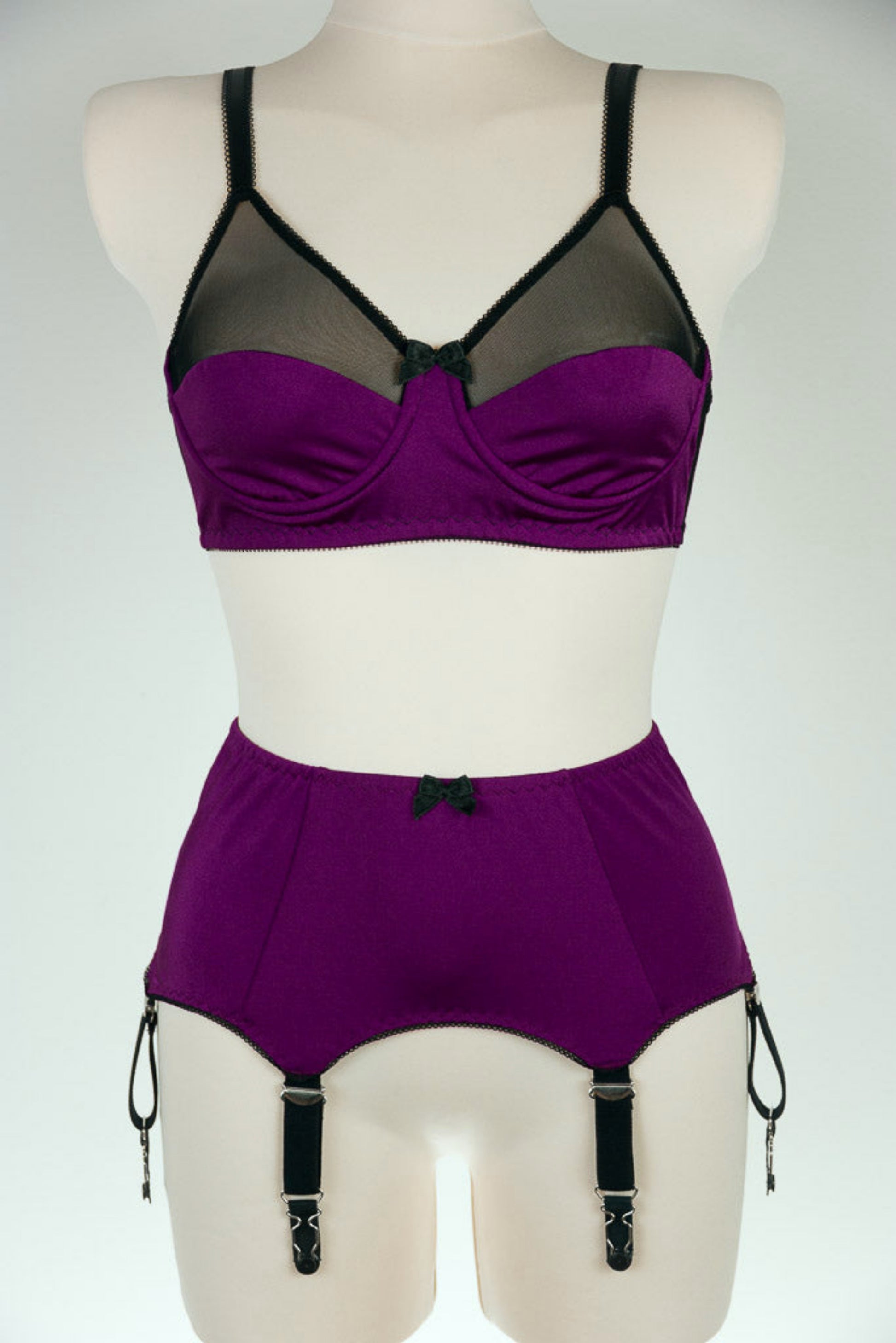 purple with 6 black straps, vintage style Greta garter belt , show with matching Audrey full cup bra