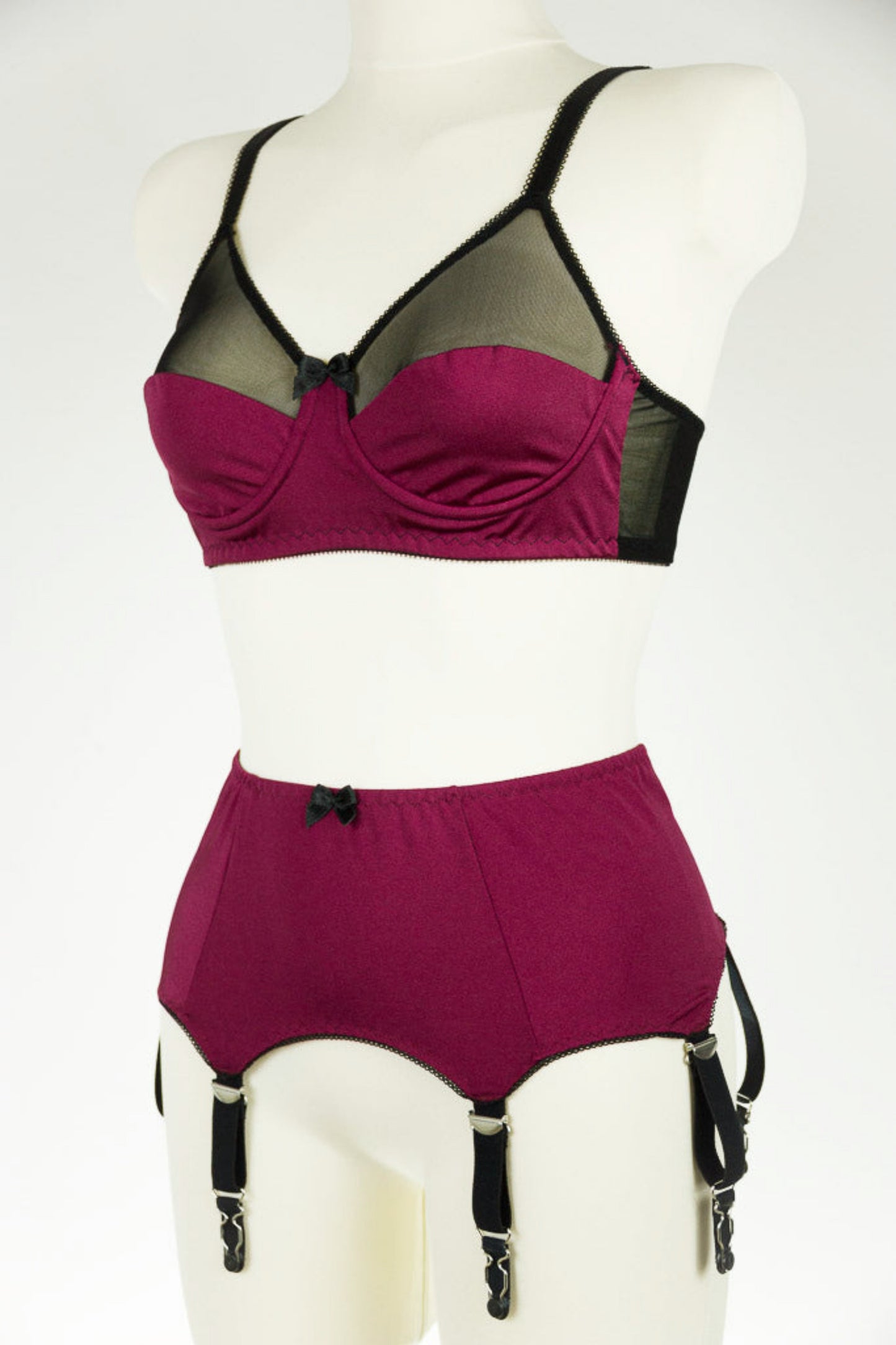 burgundy Audrey bra with black sheer the upper part of the cup, with matching Greta garter belt