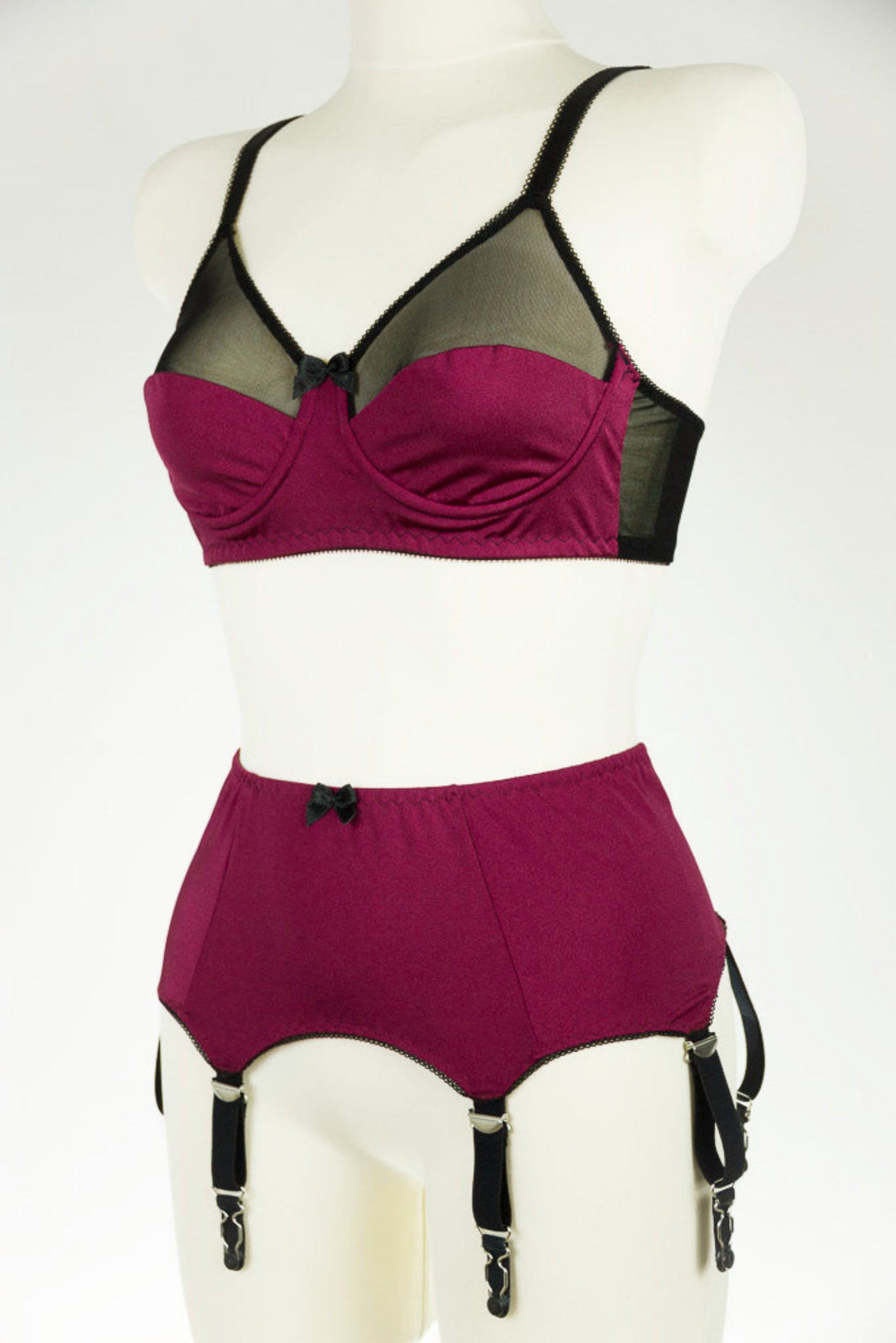 burgundy Audrey bra with black sheer the upper part of the cup, with matching  Greta garter belt