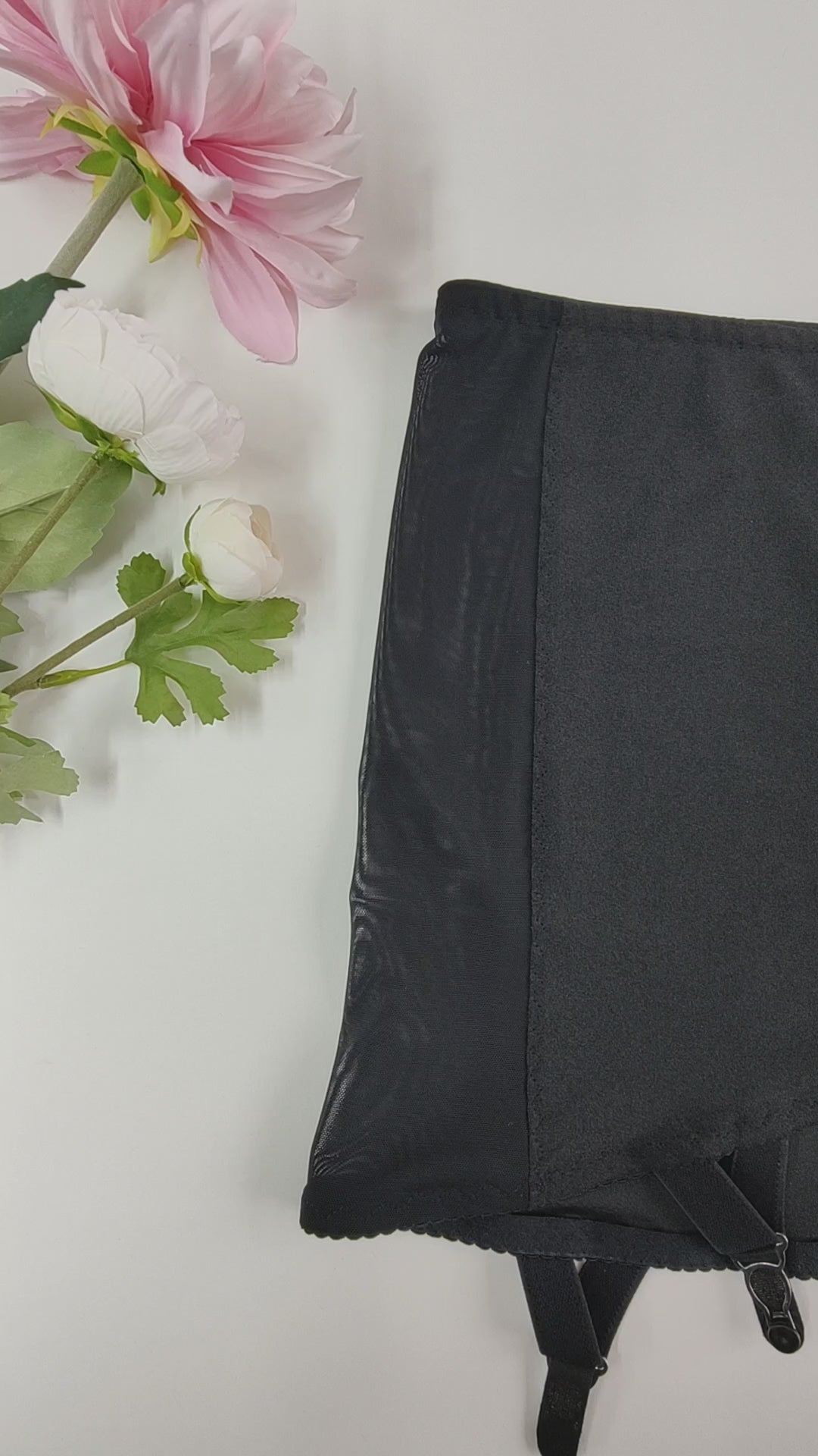 Black Smooth, light control, pull on girdle made with spandex and power mesh side panels. With 6 v style non-adjustable straps. You can have solid color girdle or mix of colors for just your own different girdle
