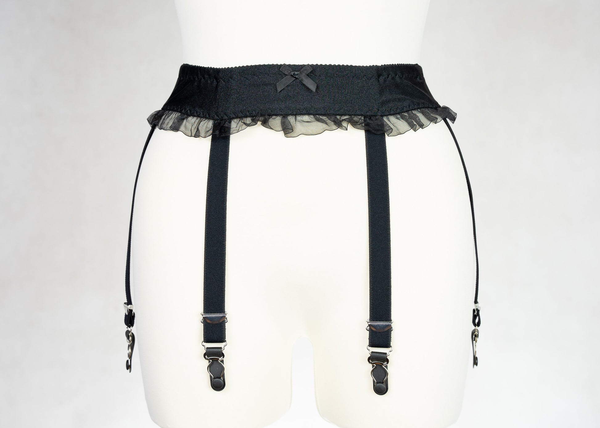 black narrow 60's style Summer garter belt with ruffle trim and 6 straps