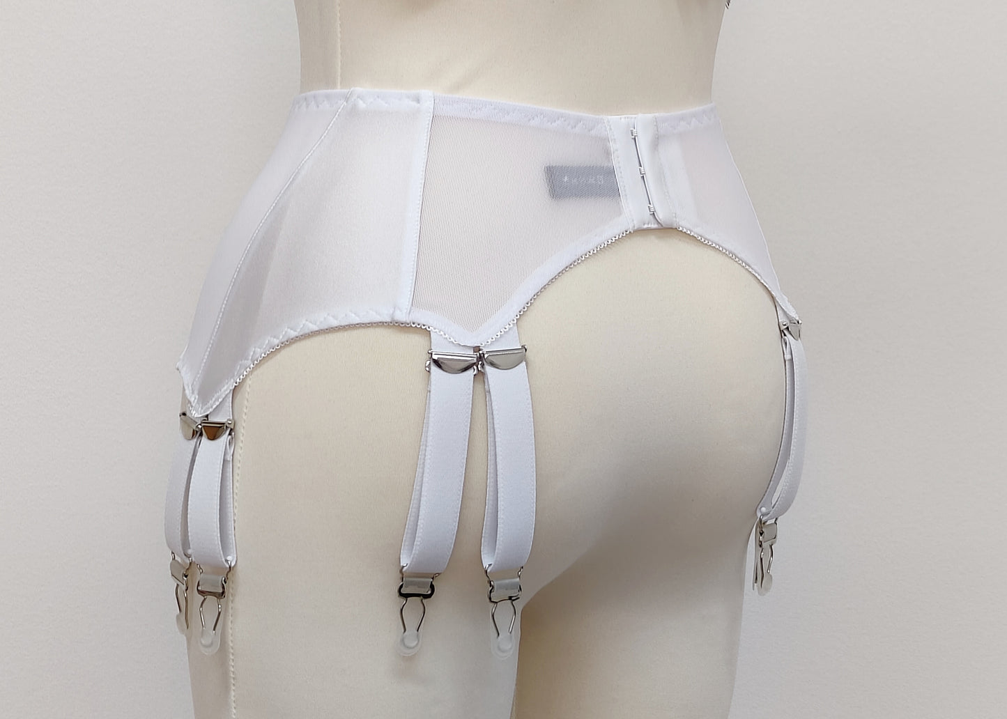 white wide 12 strap Stella garter belt, back view