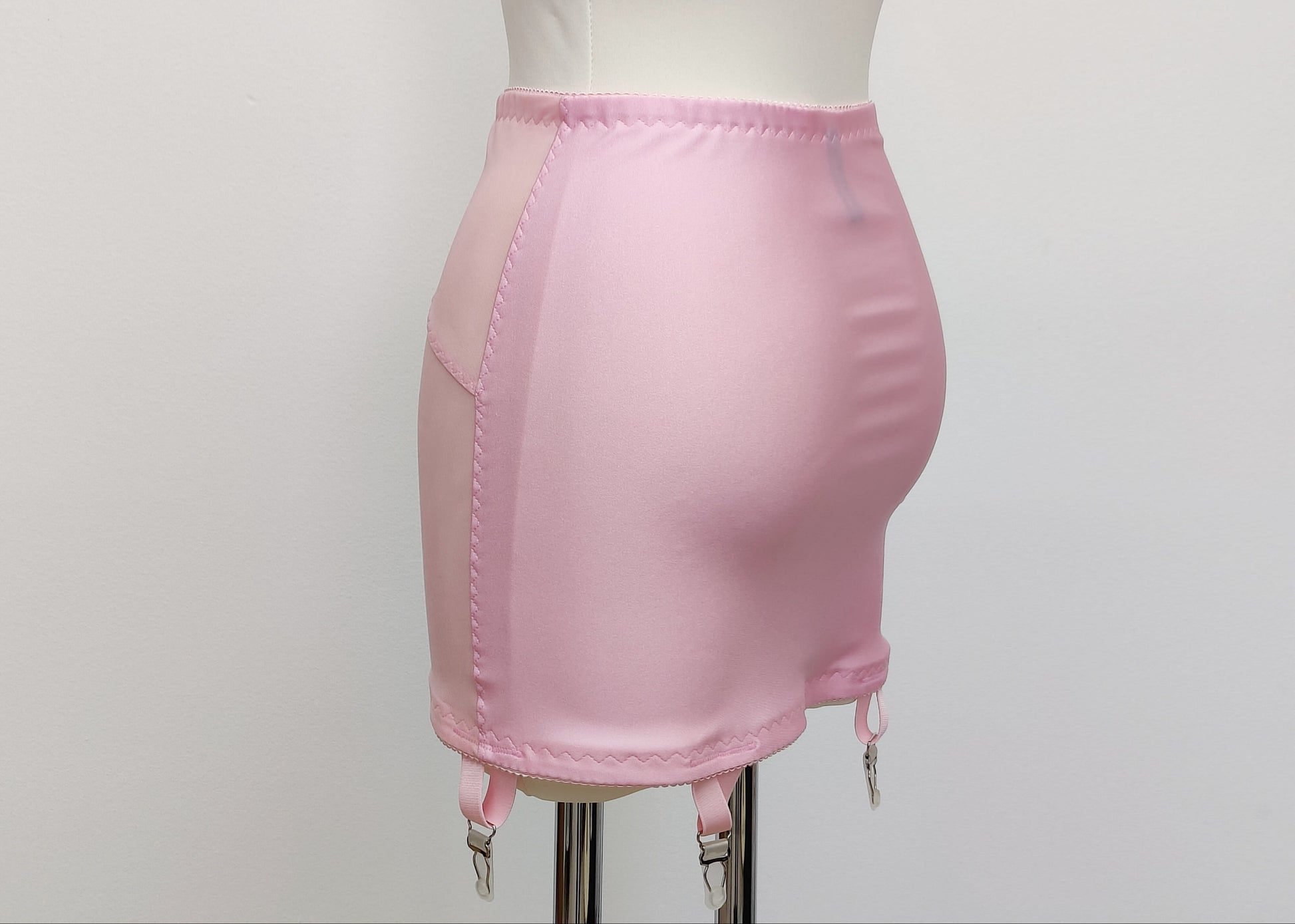 pink Open bottom Glenda girdle made with opaque front and back panels with sheer power mesh side panels. side view