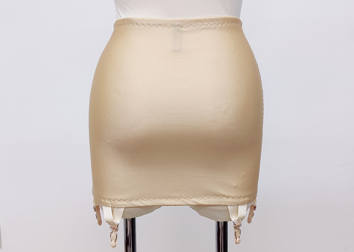 beige Open bottom Glenda girdle made with opaque front and back panels with sheer power mesh side panels. Can be made with 4 or 6 extra wide straps. back view